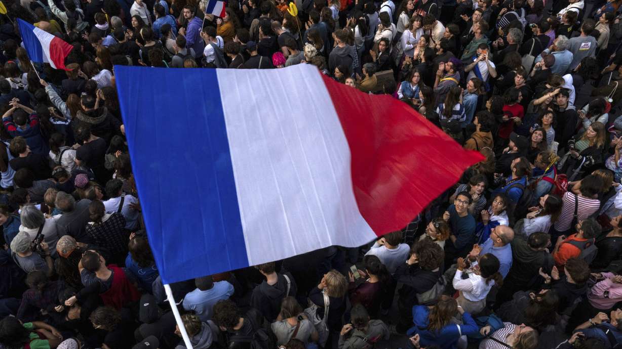 FILE - People gather at Republique plaza in a protest against the far-right, Wednesday, July 3, 2024, in Paris. France has one of Europe’s most diverse populations thanks to centuries of conquest and, in the last 200 years, immigration from Italy, Spain, eastern Europe, and France’s former colonies overseas.