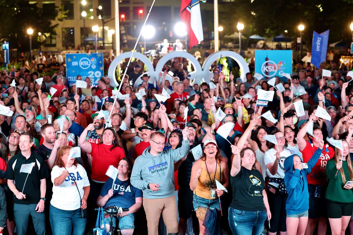 Attendees cheer during a live watch party for the Salt Lake City-Utah Committee’s 2034 Winter Olympics bid held at the Salt Lake City-County Building on Wednesday.