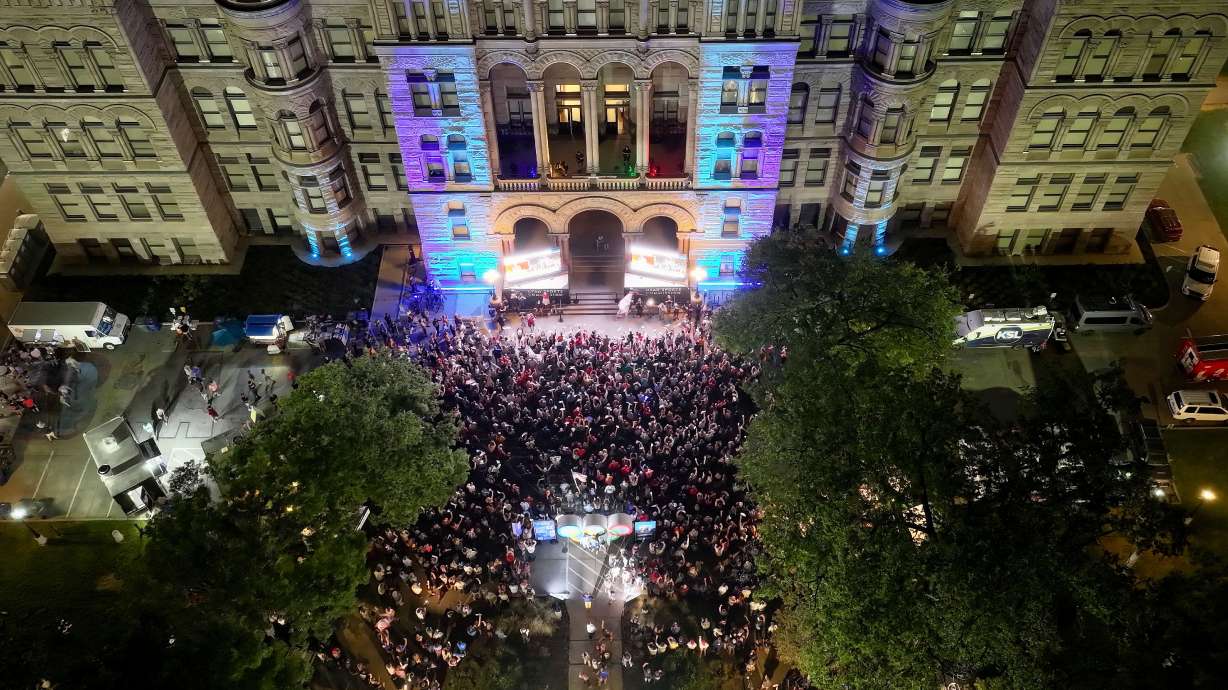 Attendees cheer during a live watch party for the Salt Lake City-Utah Committee’s 2034 Winter Olympics bid held at the Salt Lake City and County Building on July 24. Landing the Olympics was one of many "catalytic" moments in 2024, city leaders say.