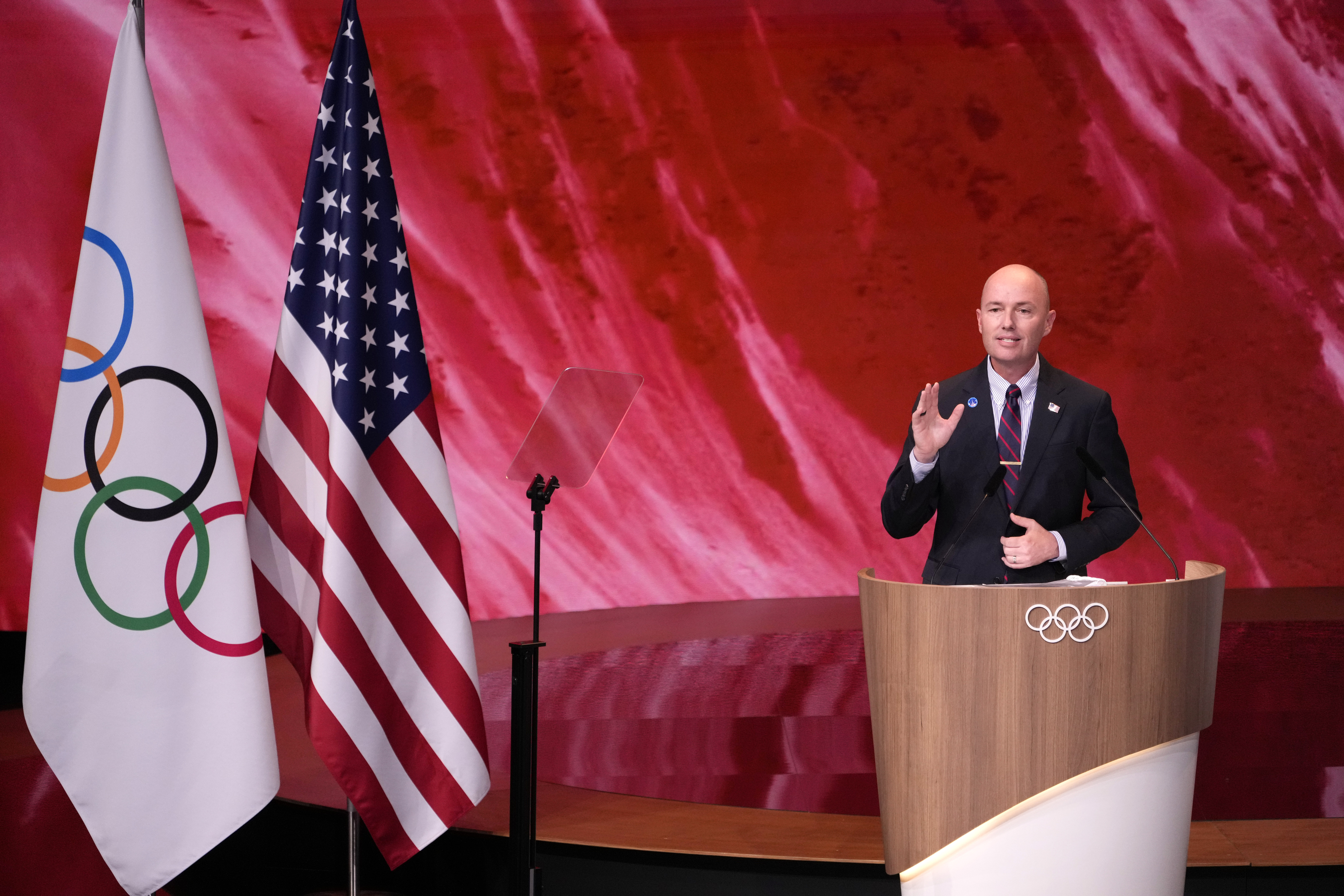 Utah Gov. Spencer Cox speaks about Salt Lake City's bid to host the 2034 Winter Olympics, during the 142nd IOC session at the 2024 Summer Olympics, Wednesday, July 24, 2024, in Paris, France.