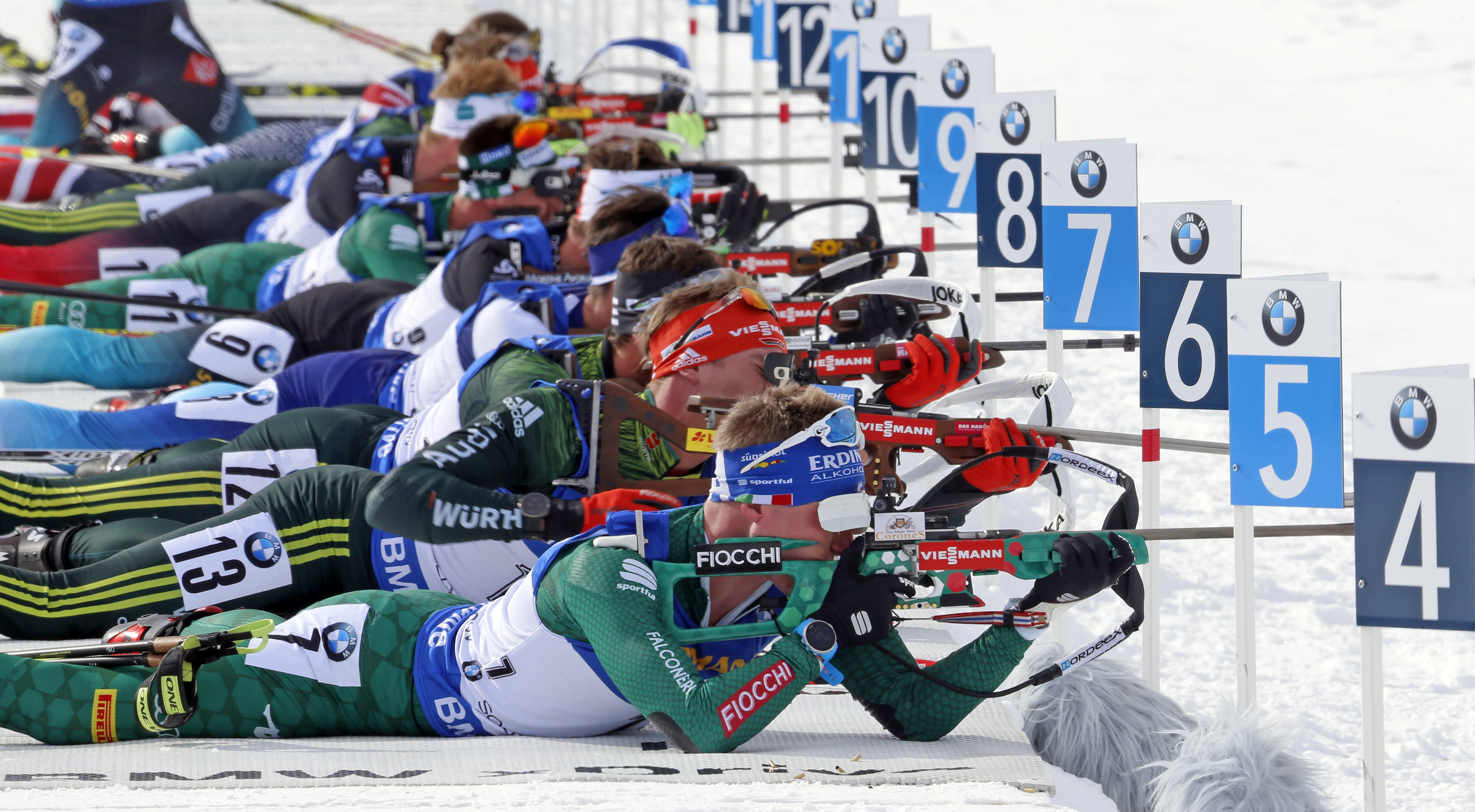 Lukas Hofer, foreground, of Italy, shoots in the men's 12.5km pursuit during the World Cup biathlon on Feb. 16, 2019, in Midway. Salt Lake City won the Olympic bid for 2034 on Wednesday.