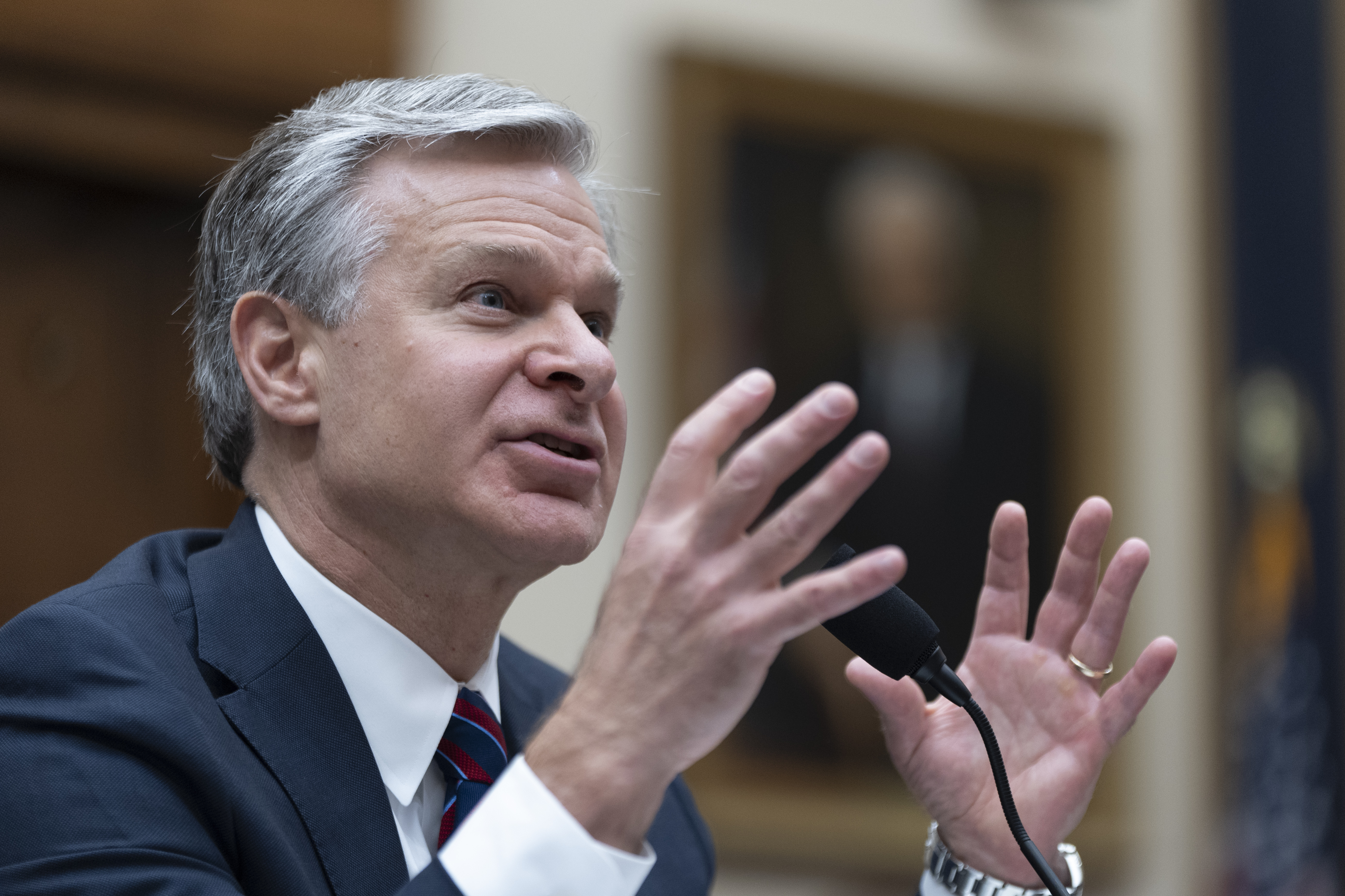 FBI Director Christopher Wray testifies before a House committee about the July 13 shooting at a campaign rally in Butler, Pennsylvania, Wednesday on Capitol Hill. Wray said that the FBI will "leave no stone unturned" in its investigation of the attempted assassination of former President Donald Trump.