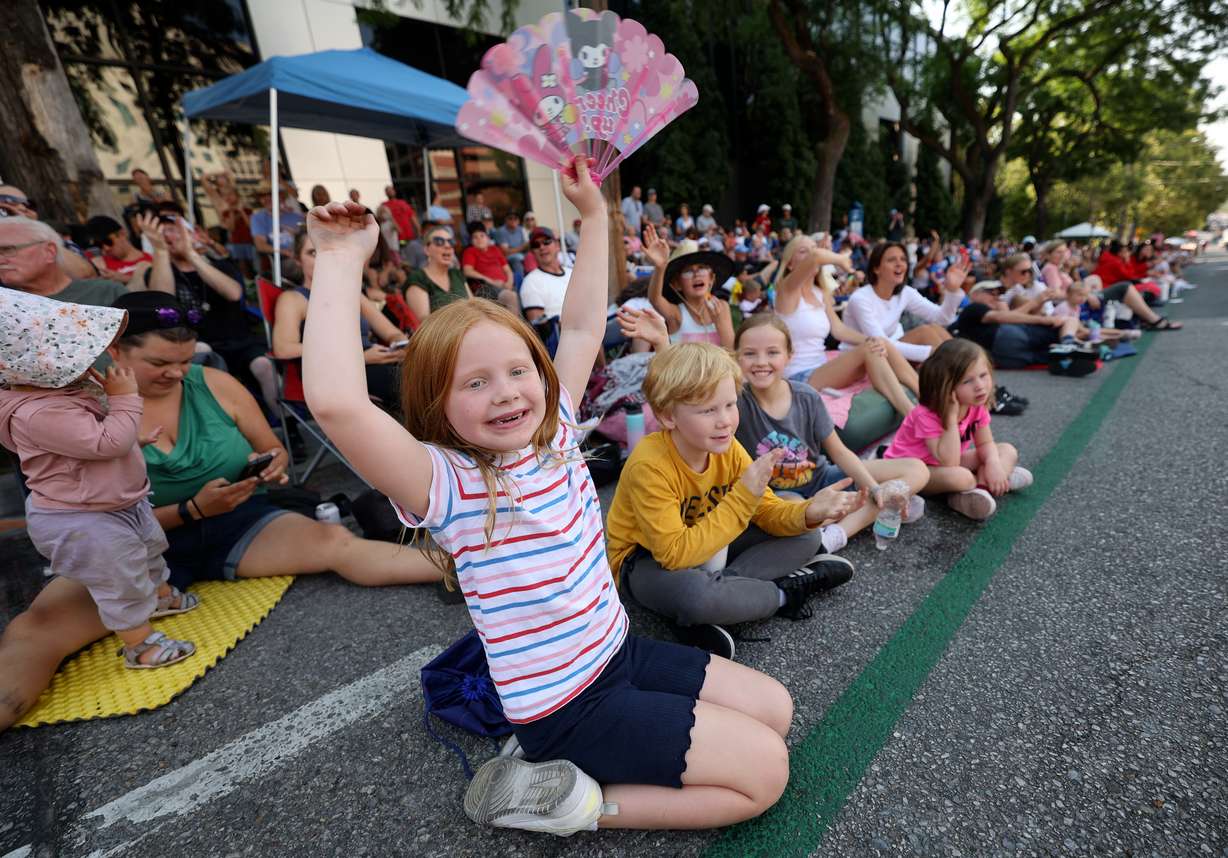 Katherine Buell cheers during the Days of ’47 Parade in downtown Salt Lake City on Wednesday.