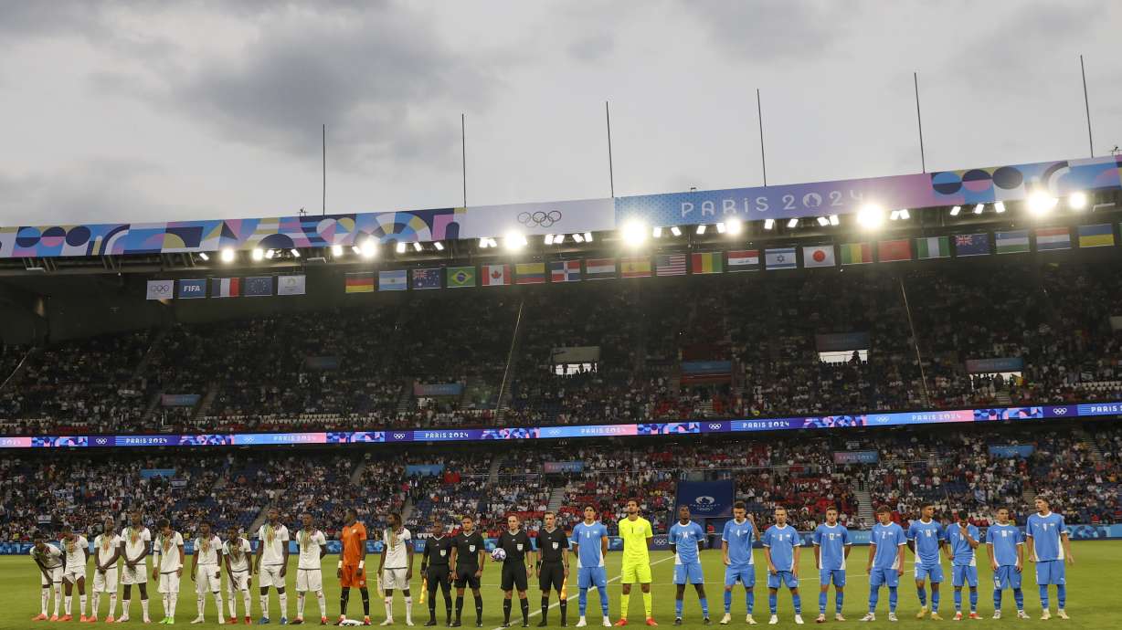 Teams Lin cup ahead of the men's group D match between Israel, right, and Mali at the Parc des Princes during the 2024 Summer Olympics, Wednesday, July 24, 2024, in Paris, France.