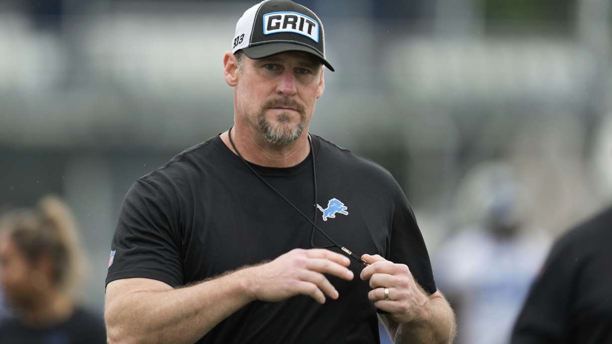 Detroit Lions head coach Dan Campbell watches during an NFL football practice in Allen Park, Mich., Wednesday, July 24, 2024.