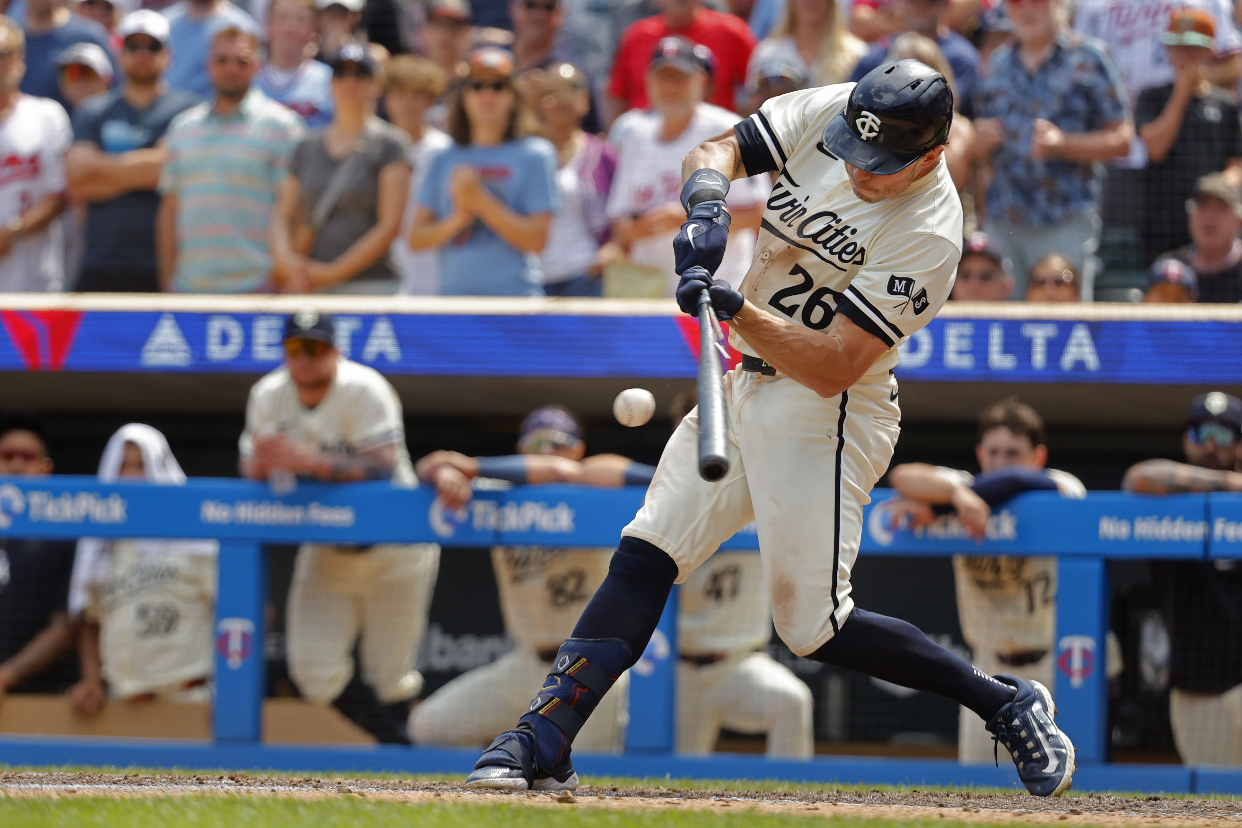 Minnesota Twins' Max Kepler hits a game-winning RBI infield single against the Philadelphia Phillies in the ninth inning of a baseball game Wednesday, July 24, 2024, in Minneapolis. 