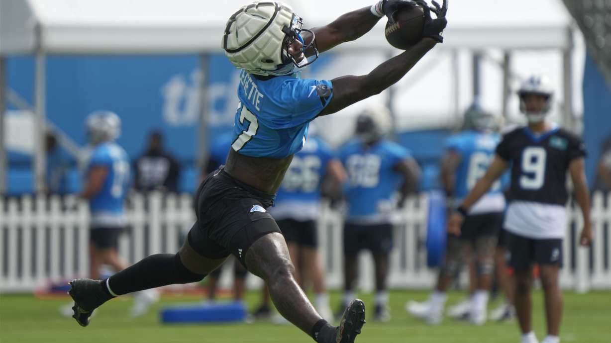 Carolina Panthers receiver Xavier Legette reaches for a catch during the NFL football team's training camp in Charlotte, N.C., Wednesday, July 24, 2024.