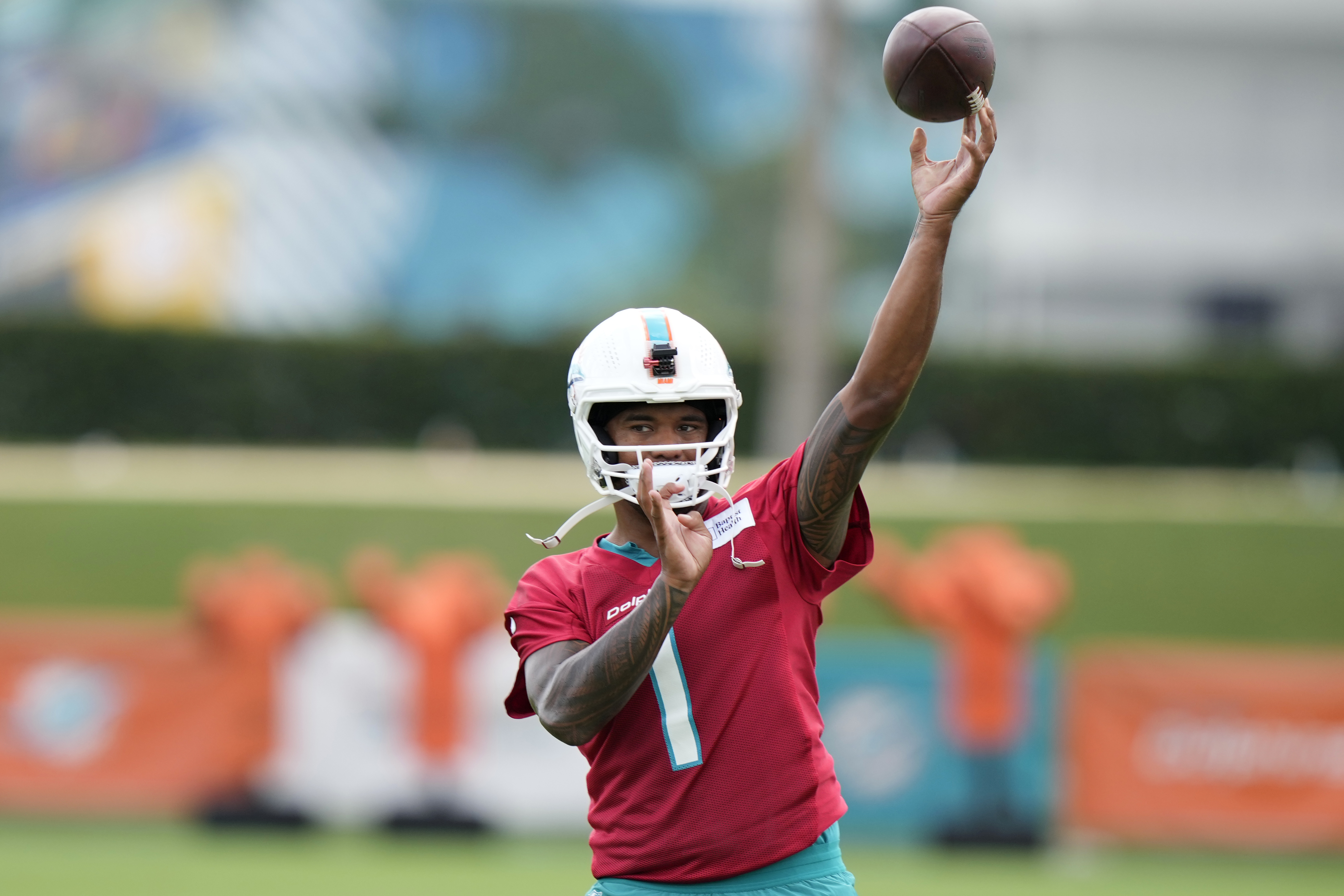 Miami Dolphins quarterback Tua Tagovailoa (1) does drills during NFL football training camp, Wednesday, July 24, 2024, in Miami Gardens, Fla. 