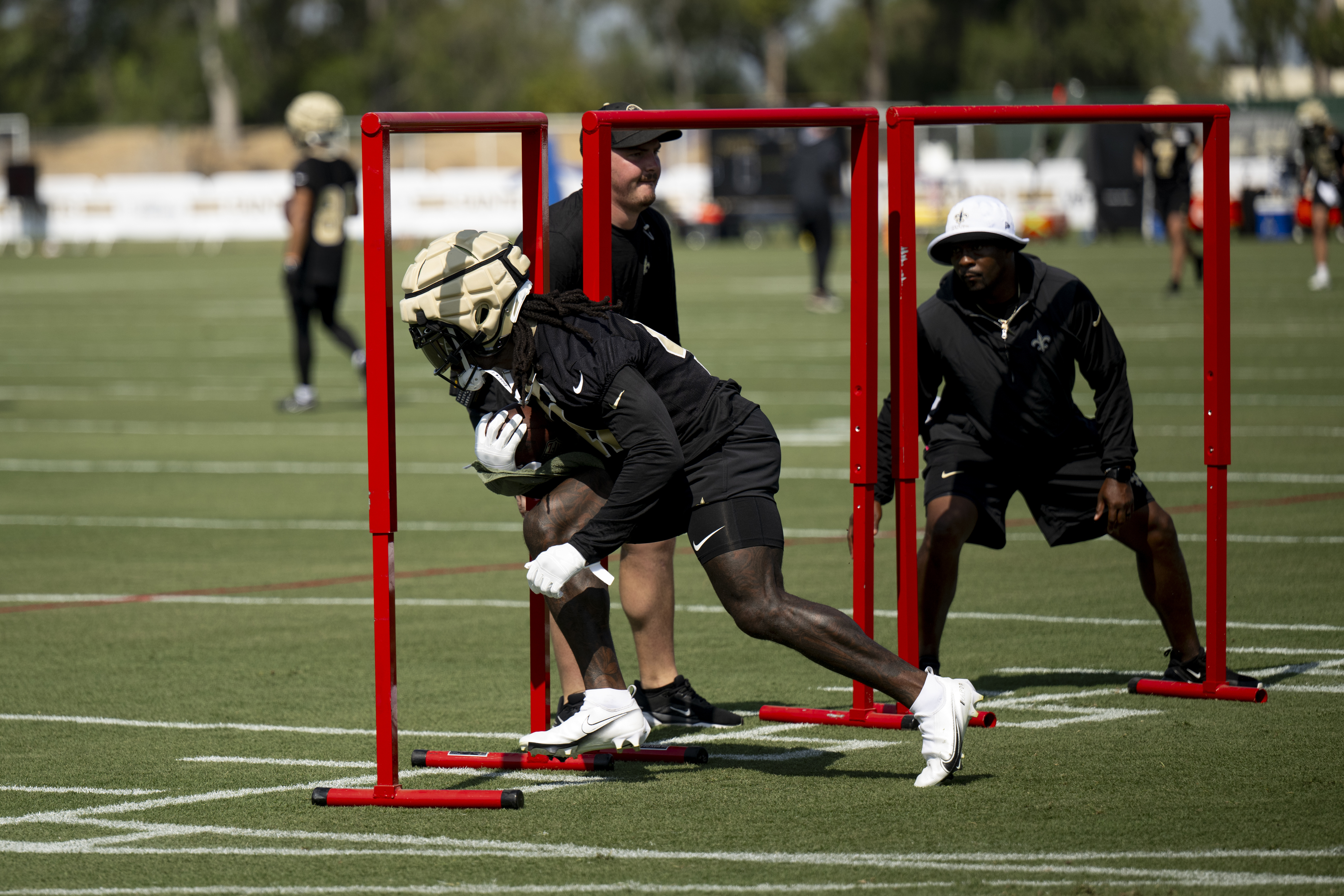 New Orleans Saints running back Alvin Kamara (41) runs with the ball during NFL football training camp, Wednesday, July 24, 2024, in Irvine, Calif. 
