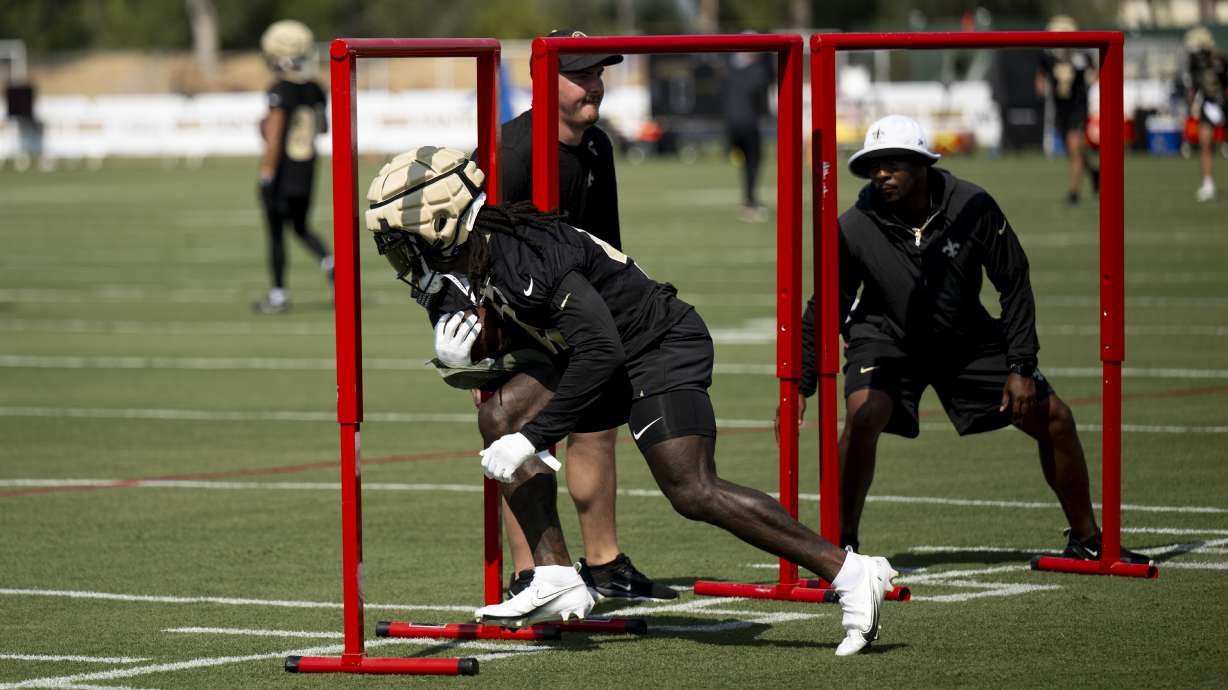 New Orleans Saints running back Alvin Kamara (41) runs with the ball during NFL football training camp, Wednesday, July 24, 2024, in Irvine, Calif.