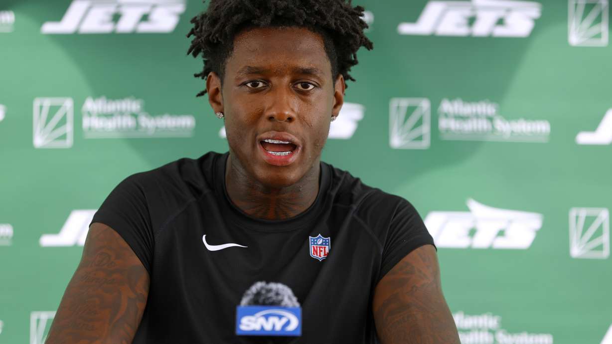 New York Jets cornerback Sauce Gardner (1) talks to reporters after the team's NFL football training camp, Wednesday, July 24, 2024, in Florham Park, N.J.