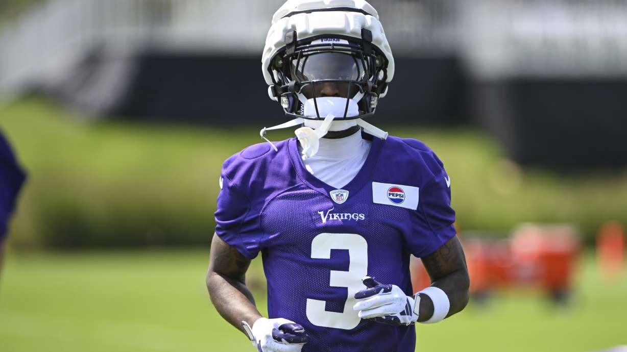 Minnesota Vikings wide receiver Jordan Addison warms up during NFL football training camp in Eagan, Minn., Wednesday, July 24, 2024.