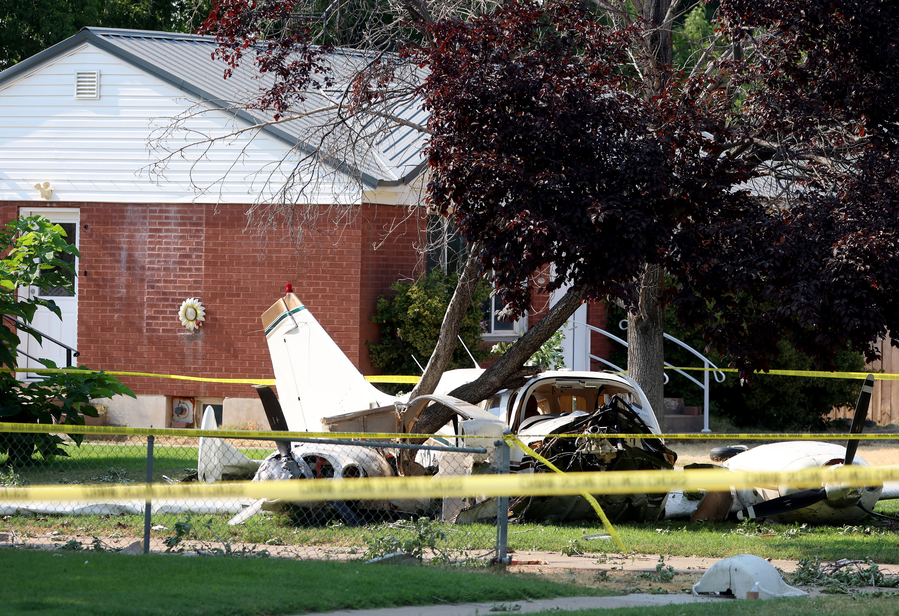 A small plane crashed into the yard of a residential home in Roy, July 24. The crash underscores the jitters brought on by the proximity of the Ogden airport to homes.