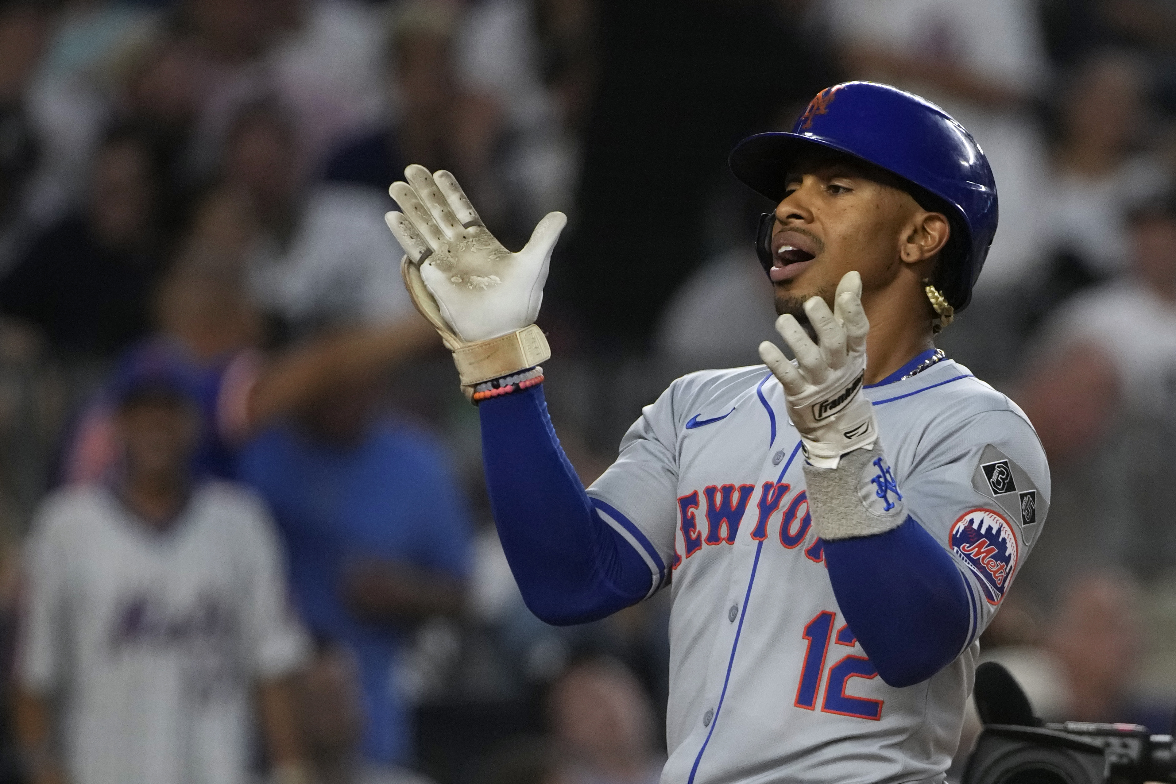 New York Mets' Francisco Lindor celebrates after hitting a two-run home run during the fifth inning of a baseball game against the New York Yankees, Wednesday, July 24, 2024, in New York. 