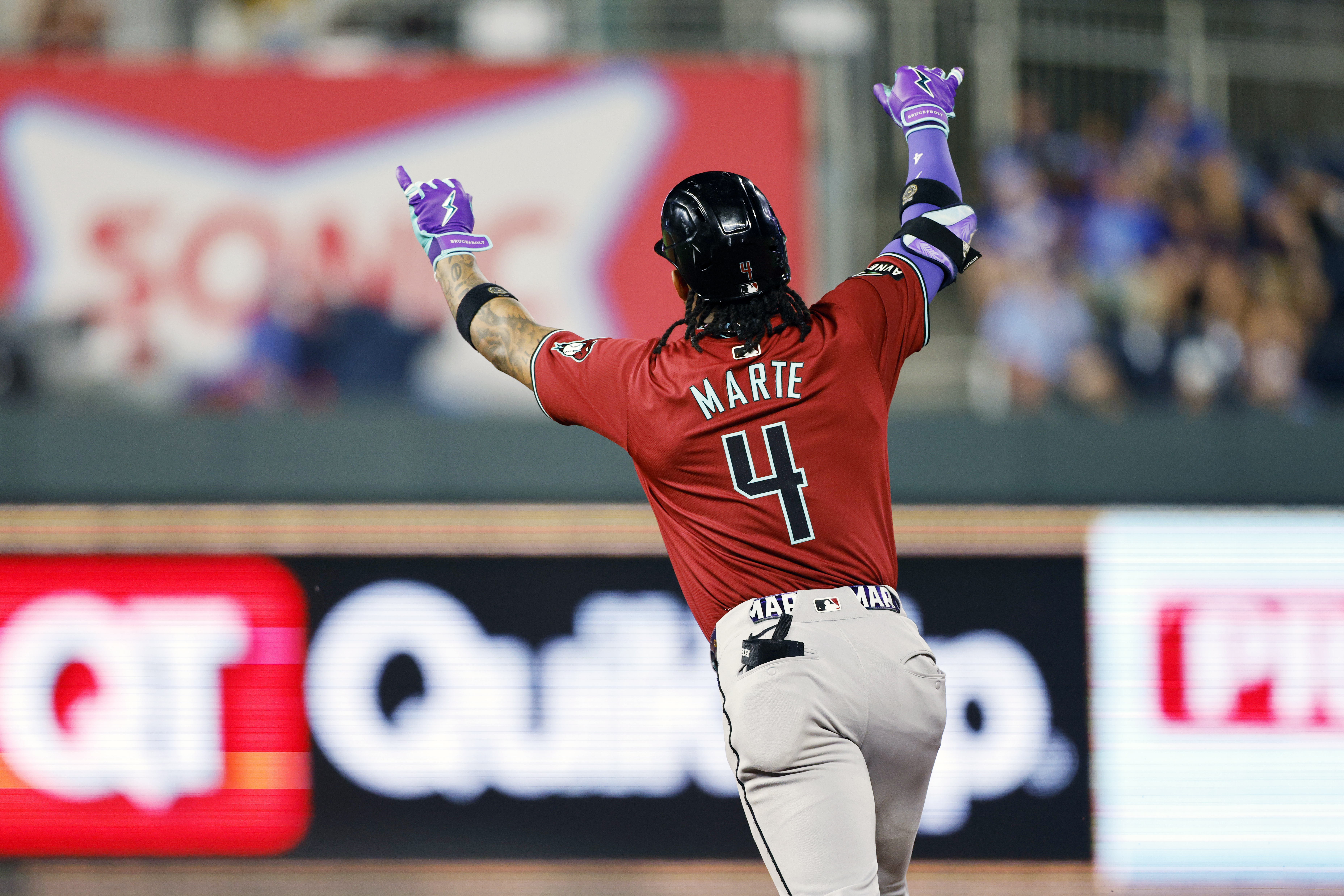 Arizona Diamondbacks' Ketel Marte celebrates hitting a three-run home during the ninth inning of a baseball game against the Kansas City Royals in Kansas City, Mo., Wednesday, July 24, 2024. 