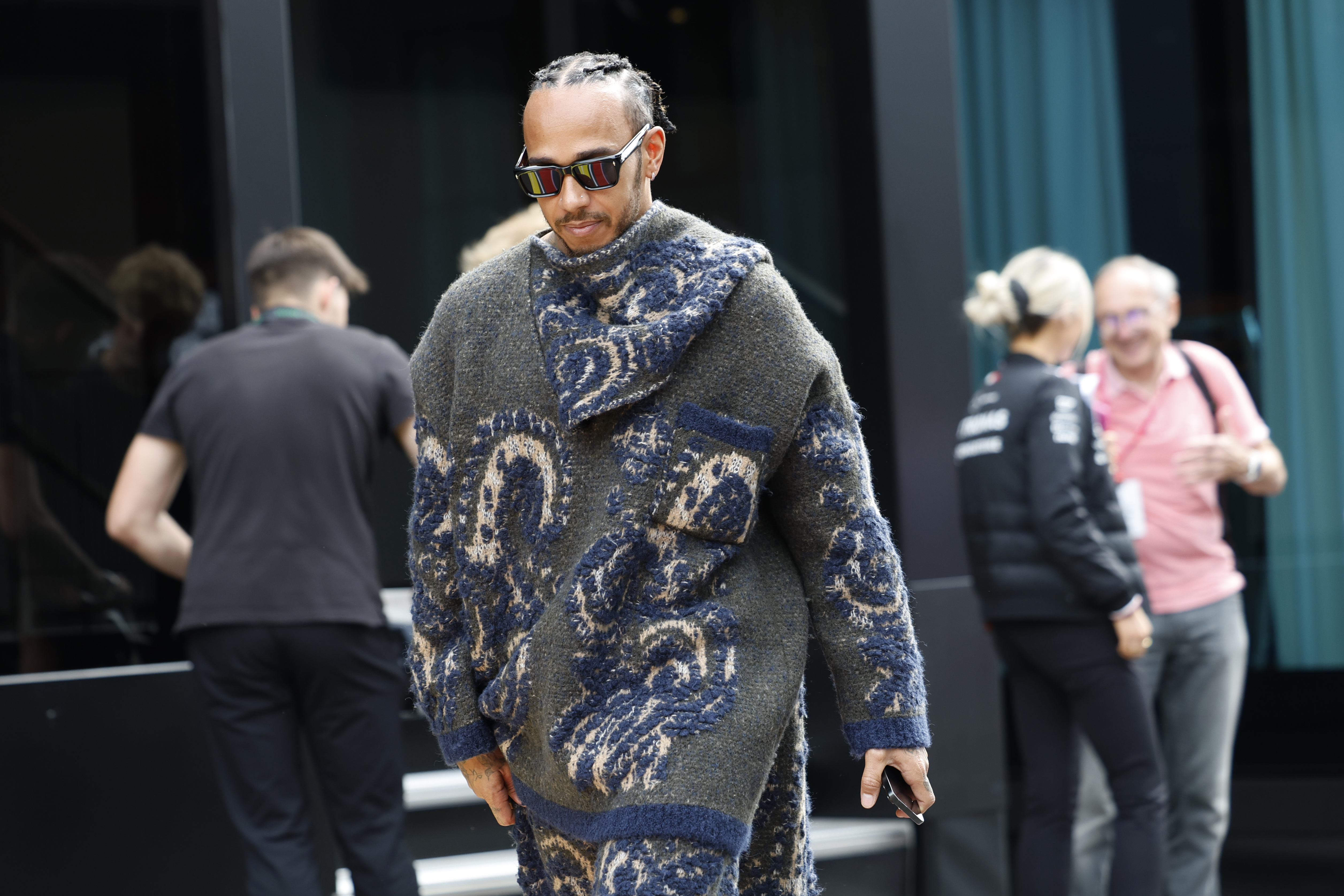 Mercedes driver Lewis Hamilton of Britain arrives in the paddock ahead of the Formula One Grand Prix at the Spa-Francorchamps racetrack in Spa, Belgium, Thursday, July 25, 2024. The Belgian Formula One Grand Prix will take place on Sunday.