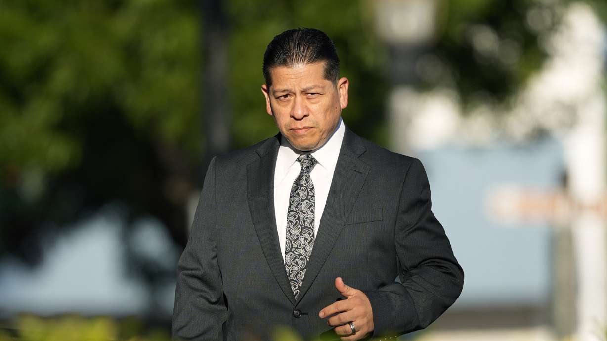 Former Uvalde Consolidated Independent School District police officer Adrian Gonzales arrives at the Uvalde County Courthouse, Thursday, in Uvalde, Texas. Gonzales made his first court appearance on charges of abandoning and failing to protect children.