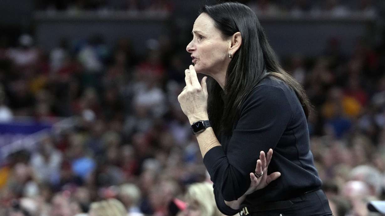 FILE - New York Liberty head coach Sandy Brondello watches during the second half of a WNBA basketball game against the Indiana Fever, Saturday, July 6, 2024, in Indianapolis. Brondello said Thursday, July 25, 2024 it will be hard to replace forward Bec Allen, who also plays in the WNBA for the Phoenix Mercury. The Opals announced that Allen will miss what would have been her second Olympics after tests revealed a high grade hamstring injury suffered in the Opals' final warm-up for the Paris Games.