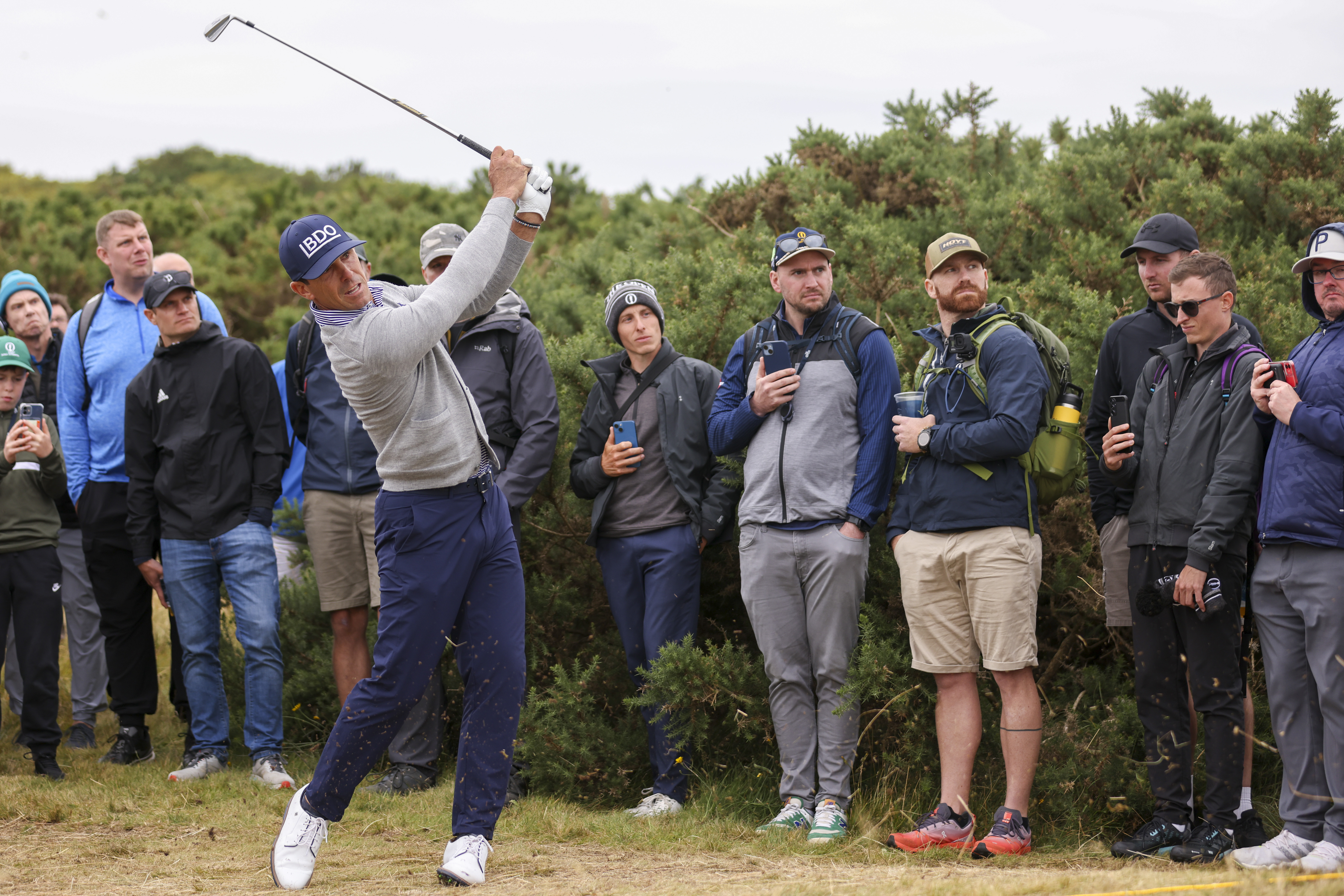 Billy Horschel of the United States plays from the rough on the 12th hole during his final round of the British Open Golf Championships at Royal Troon golf club in Troon, Scotland, Sunday, July 21, 2024.
