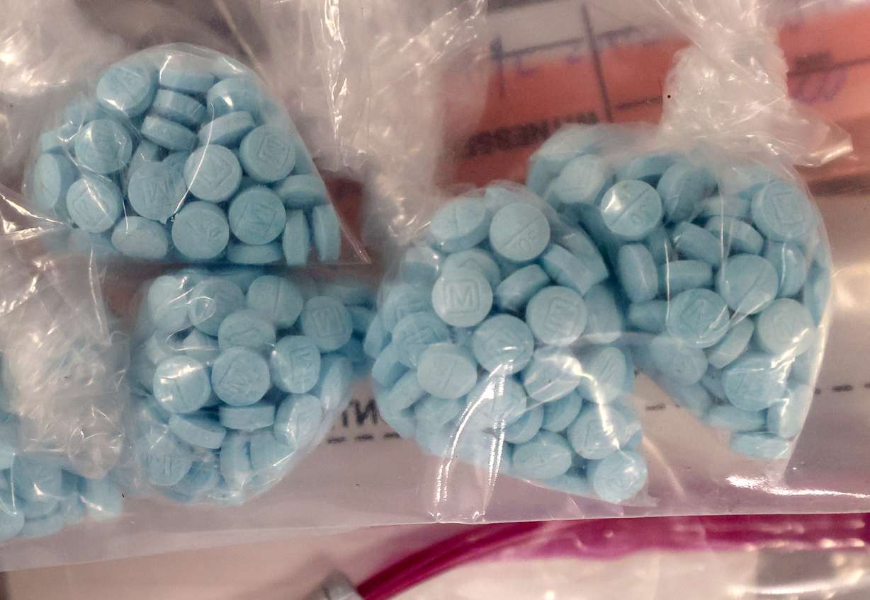 Seized fentanyl pills are displayed during a press conference about the dangers and increase in fentanyl at the Drug Enforcement Administration Salt Lake City District Office in Salt Lake City on Thursday. The pills are marked to look like authentic pharmaceutical drugs but are fake and can be deadly.