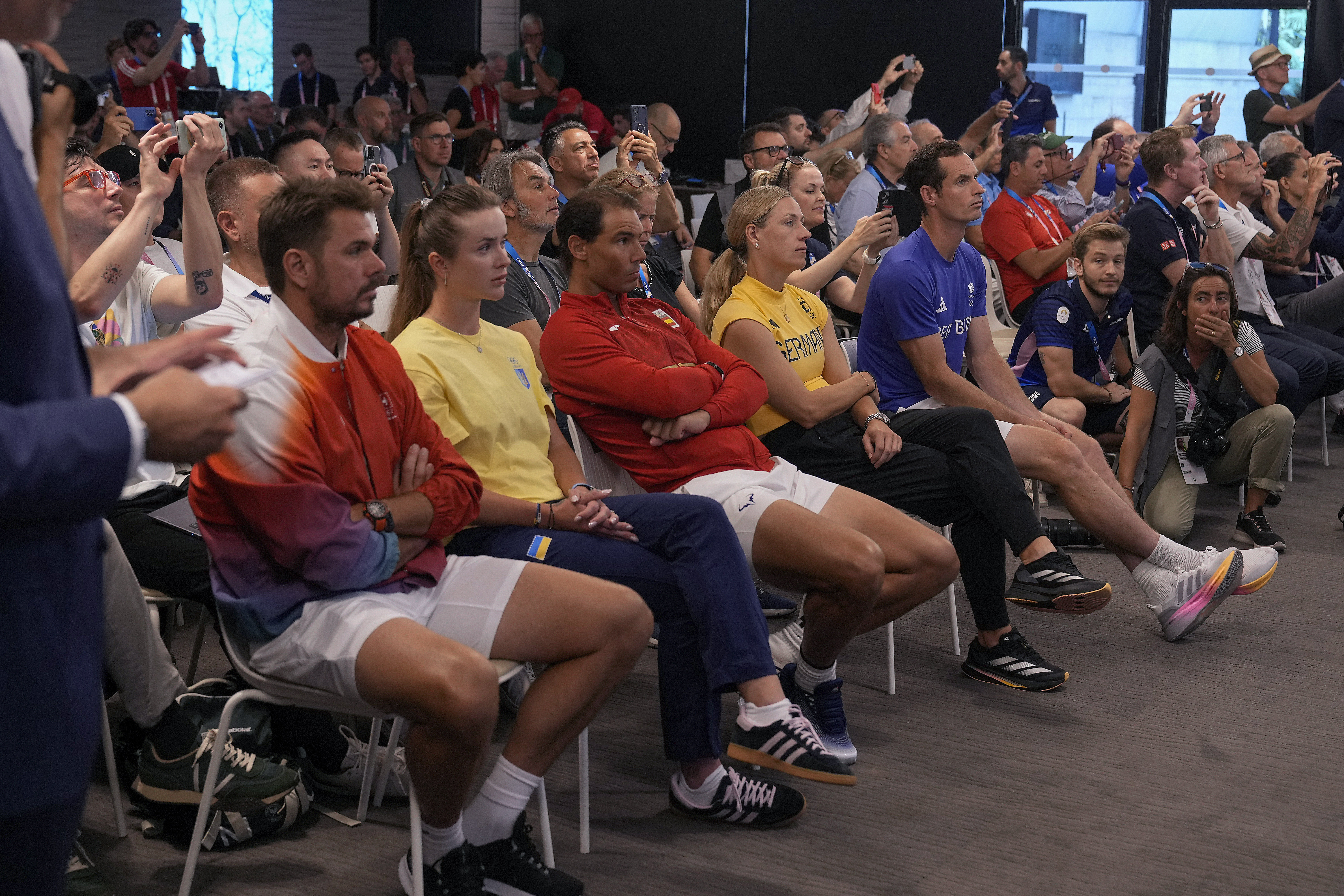 Tennis players from left, Stan Wawrinka of Switzerland, Elina Svitolina of Ukraine, Rafael Nadal of Spain, Angelique Kerber of Germany and Andy Murray of Britain attend the tennis official draw ceremony, at the 2024 Summer Olympics, Thursday, July 25, 2024, in Paris, France.