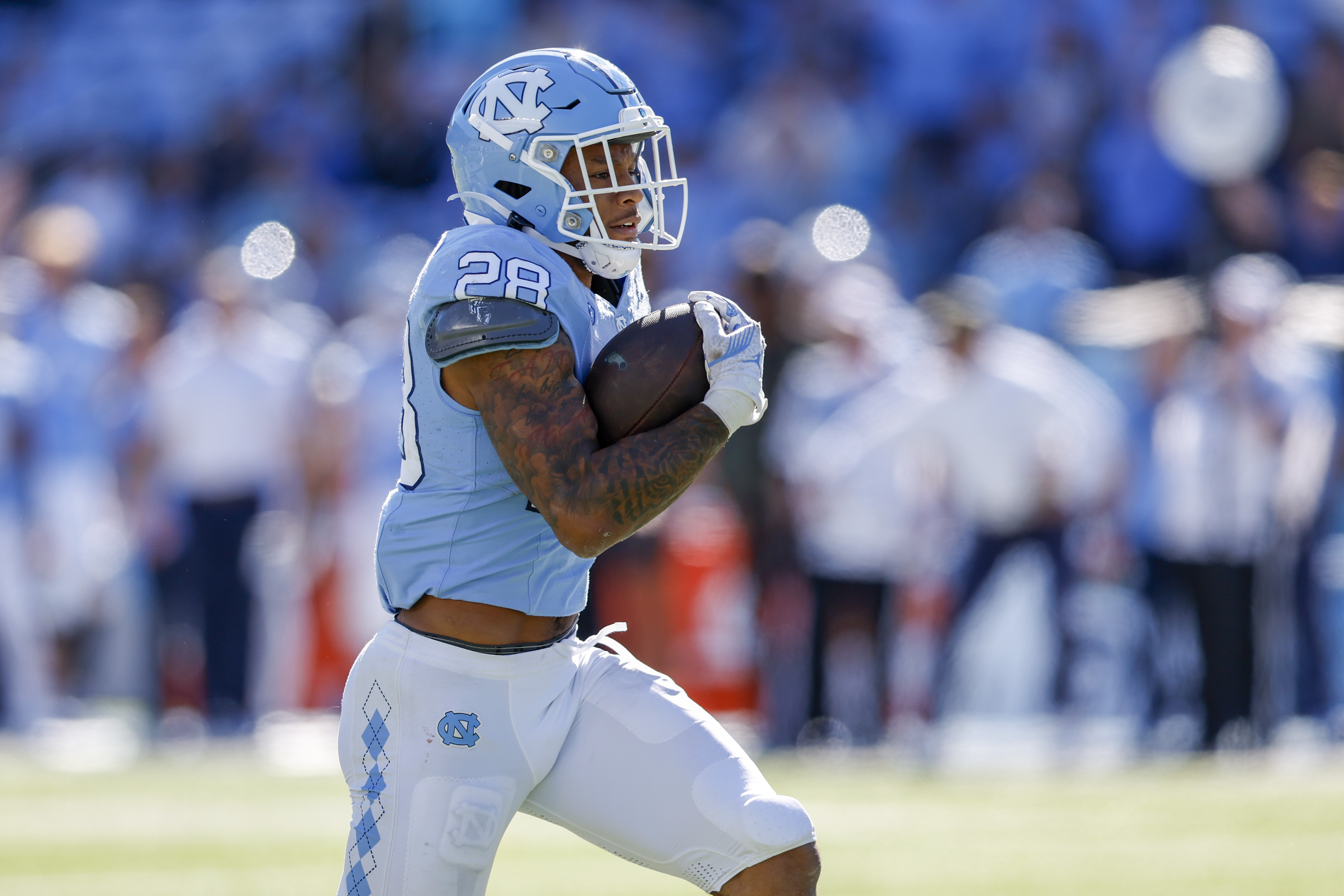 North Carolina running back Omarion Hampton runs for a touchdown in the first half of an NCAA college football game against Campbell in Chapel Hill, N.C., Nov. 4, 2023. Hampton ran for 1,504 yards and 15 touchdowns last season for the North Carolina Tar Heels. The 1,504 yards rushing were fifth-most in the nation.