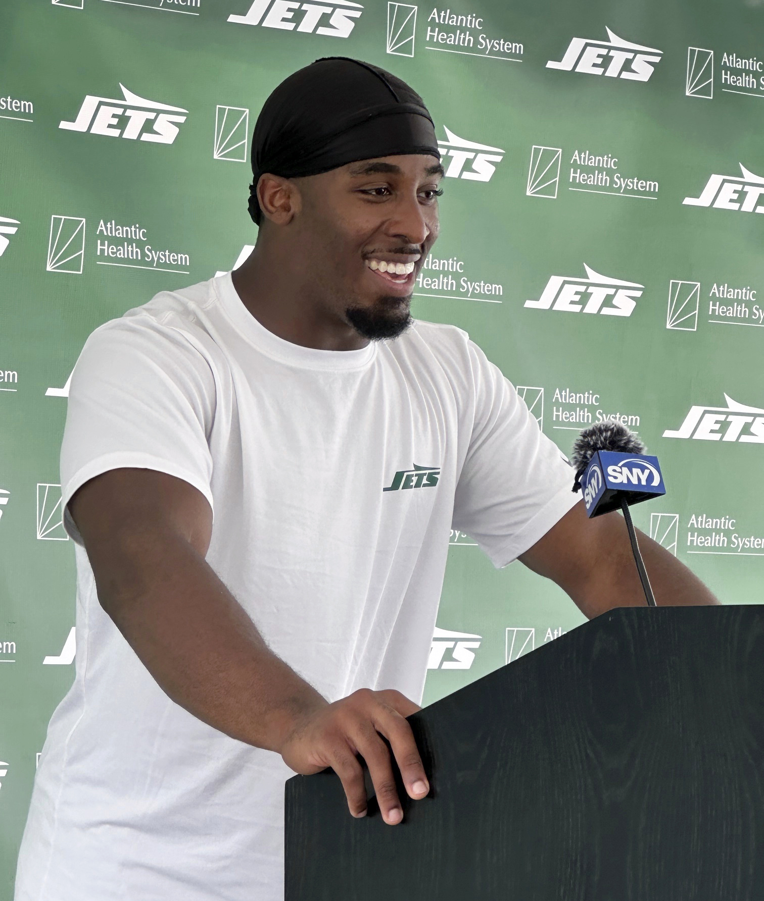 New York Jets running back Breece Hall speaks with reporters after the practice at NFL football training camp, Thursday, July 25, 2024, in Florham Park, N.J.. 