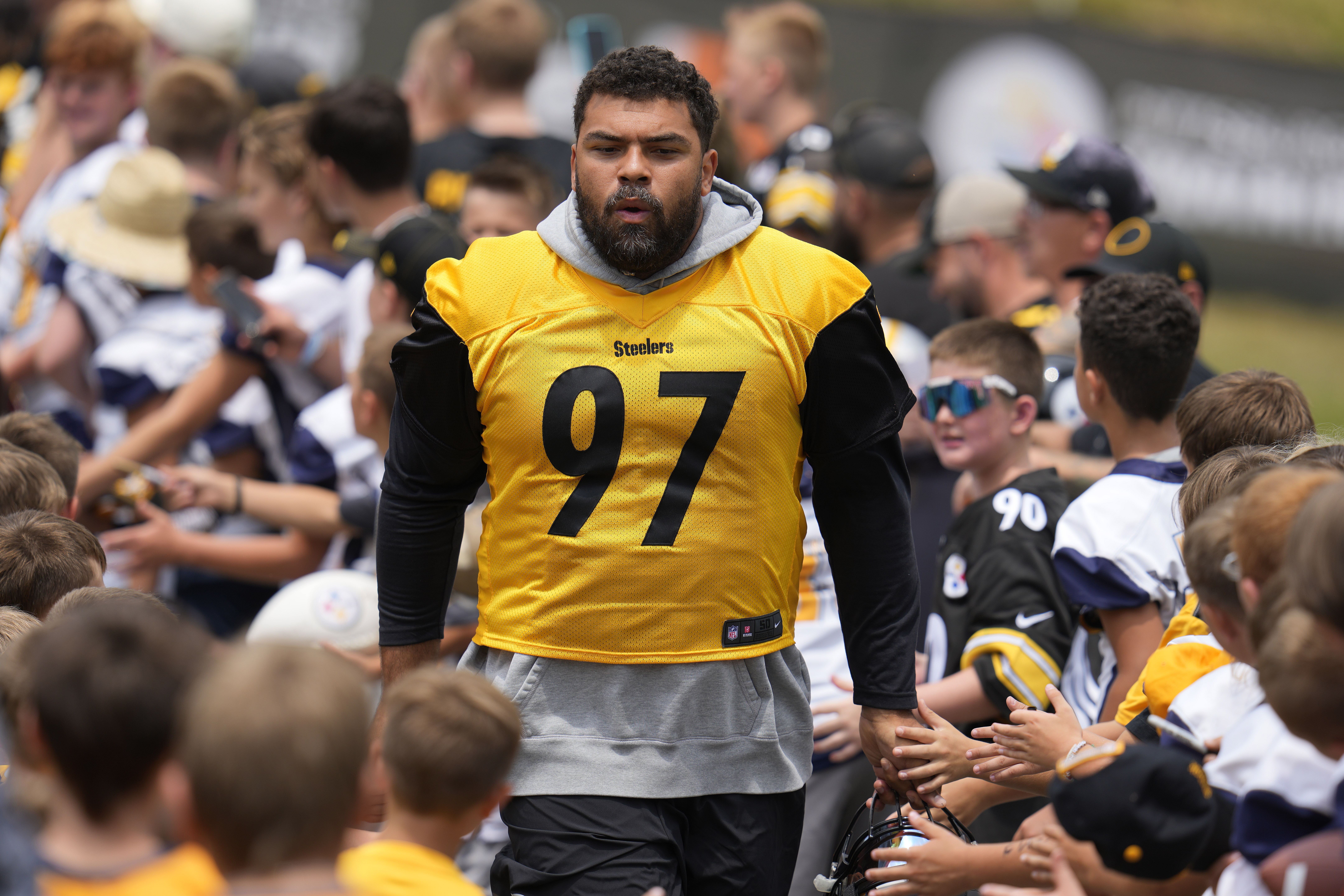 FILE - Pittsburgh Steelers defensive tackle Cameron Heyward arrives for the NFL football team's training camp workout in Latrobe, Pa., July 27, 2023. Heyward said Thursday, July 25, 2024 he wants to retire with the Steelers. The 35-year-old defensive tackle also understands it's likely not his call. 