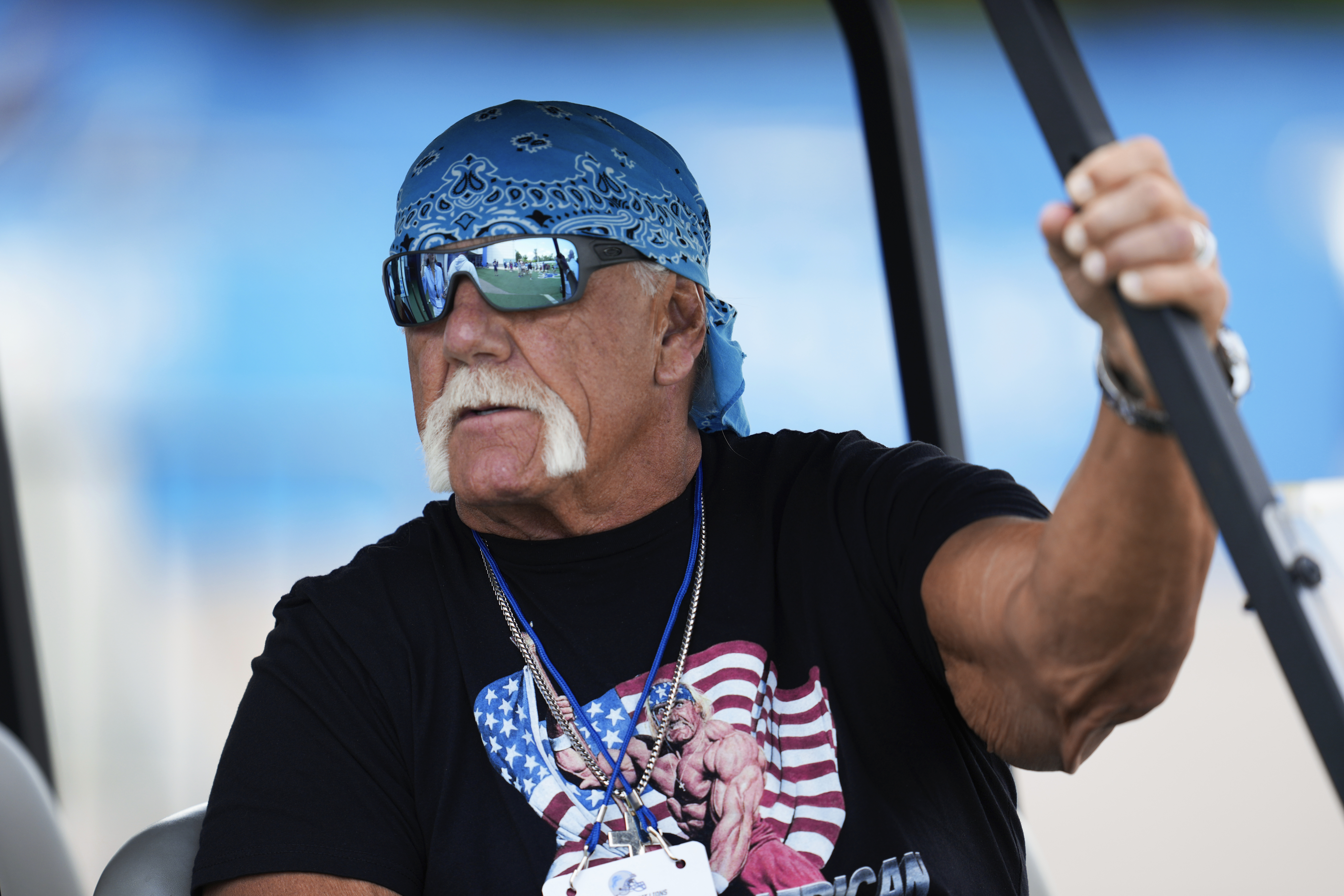 Former professional wrestler Hulk Hogan watches during a Detroit Lions NFL football practice in Allen Park, Mich., Thursday, July 25, 2024. 