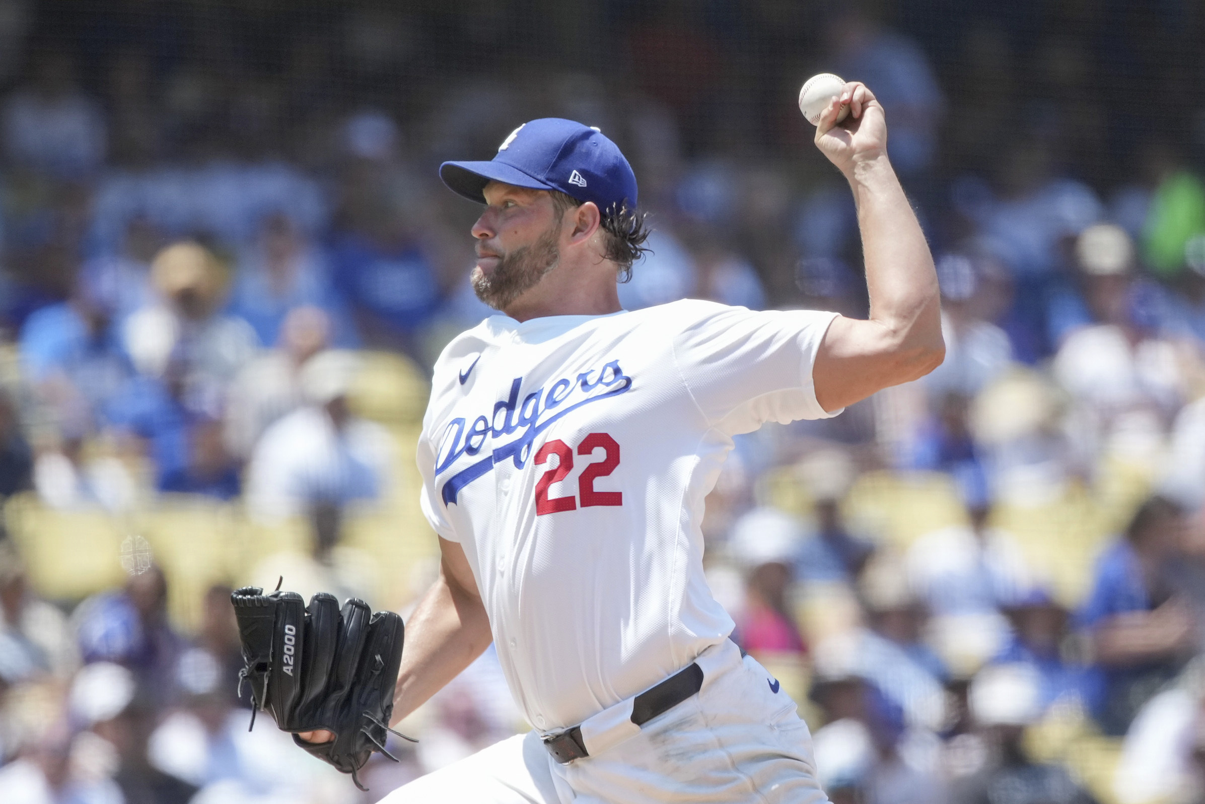 Los Angeles Dodgers starting pitcher Clayton Kershaw (22) throws a pitch during the third inning of a baseball game against the San Francisco Giants in Los Angeles, Calif., Thursday, July 25, 2024. 