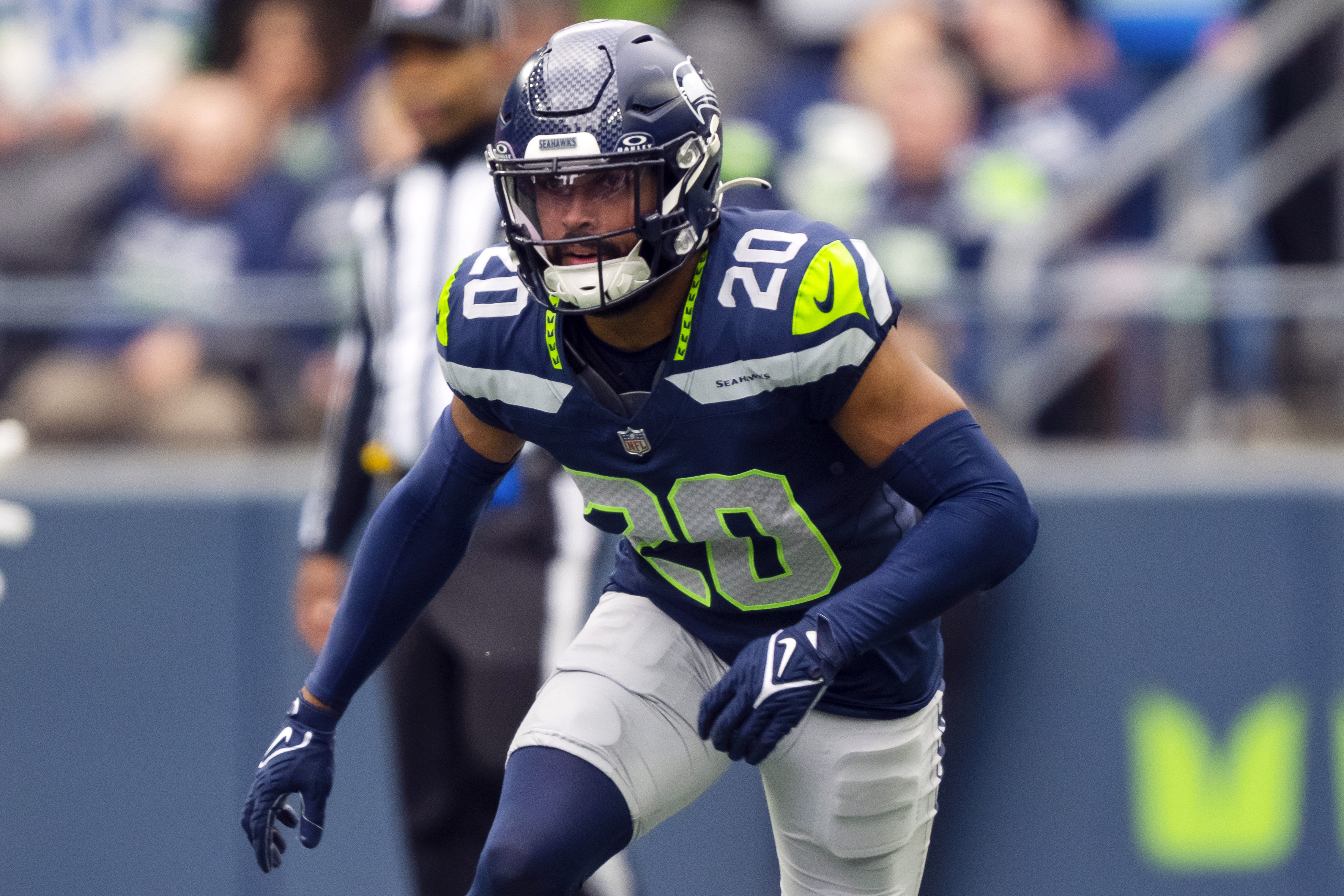 FILE - Seattle Seahawks safety Julian Love (20) runs during an NFL football game against the Arizona Cardinals, Sunday, Oct. 22, 2023 in Seattle. The Seahawks and Love have reached agreement on a three-year extension that could be worth up to $36 million. 