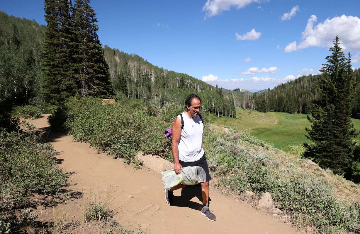 Eddie Hart hikes on the Bloods Lake trail in Wasatch County on Thursday.