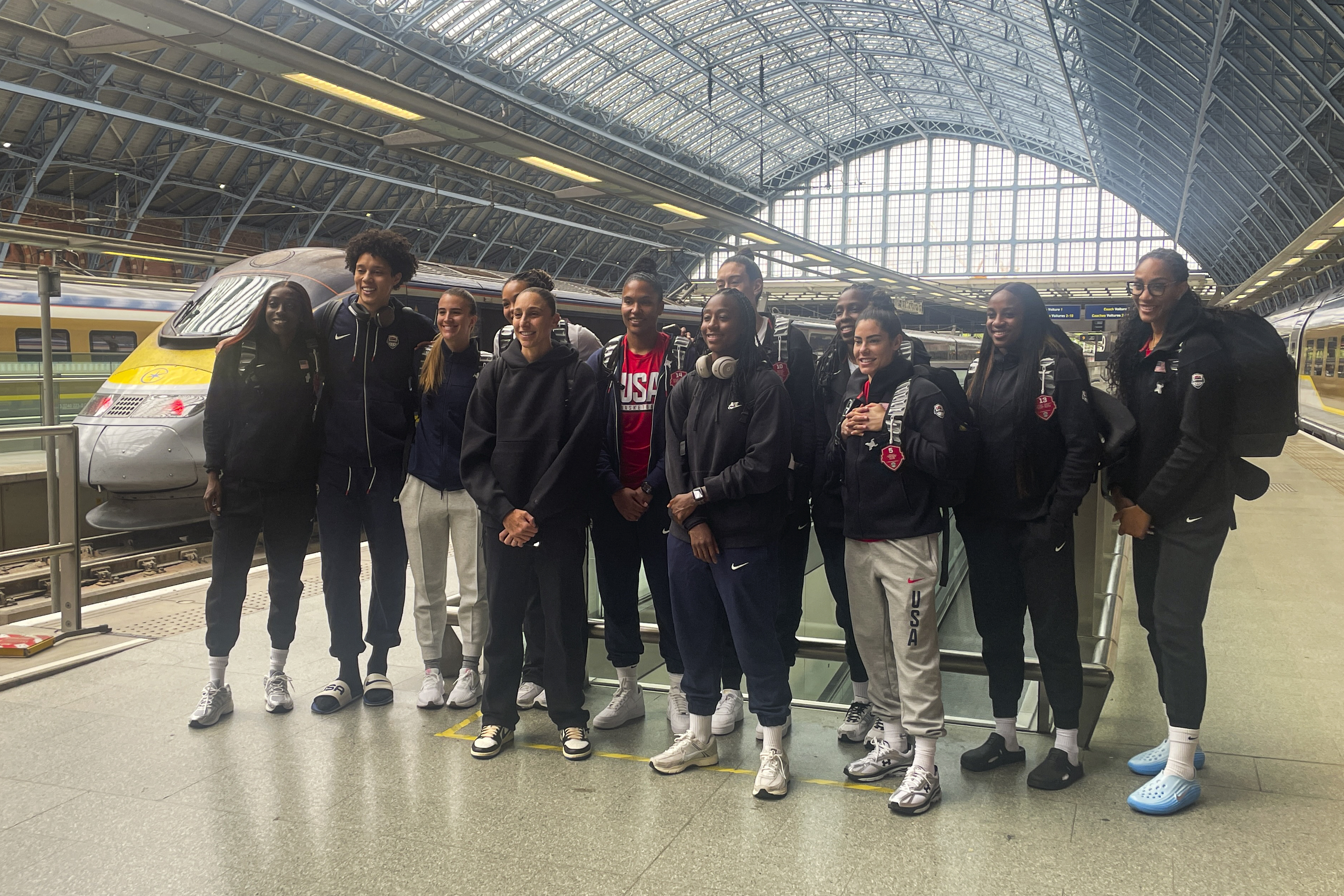 The United States women's National Basketball Team pose for photographs at St Pancras Station as they take the Eurostar train to Paris, ahead of the 2024 Summer Olympics, in London, Thursday, July 25, 2024. 