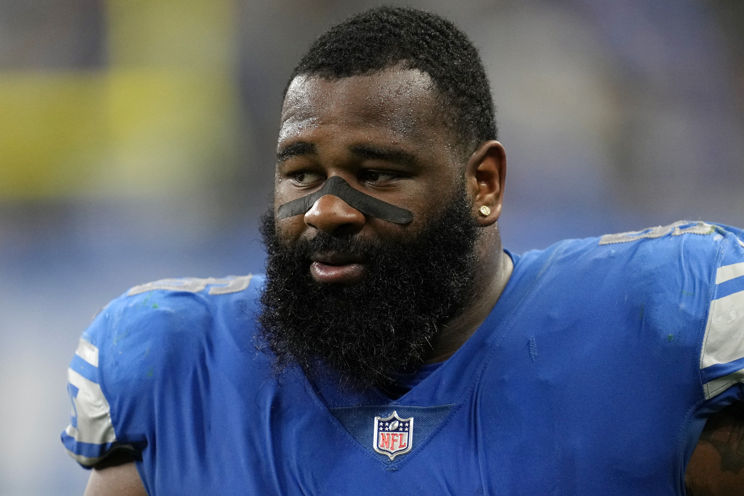 FILE- Then-Detroit Lions defensive end Isaiah Buggs (96) watches the game against the Green Bay Packers in Detroit, Nov. 6, 2022. Buggs was sentenced on two counts of misdemeanor animal cruelty charges Friday, July 19, 2024.