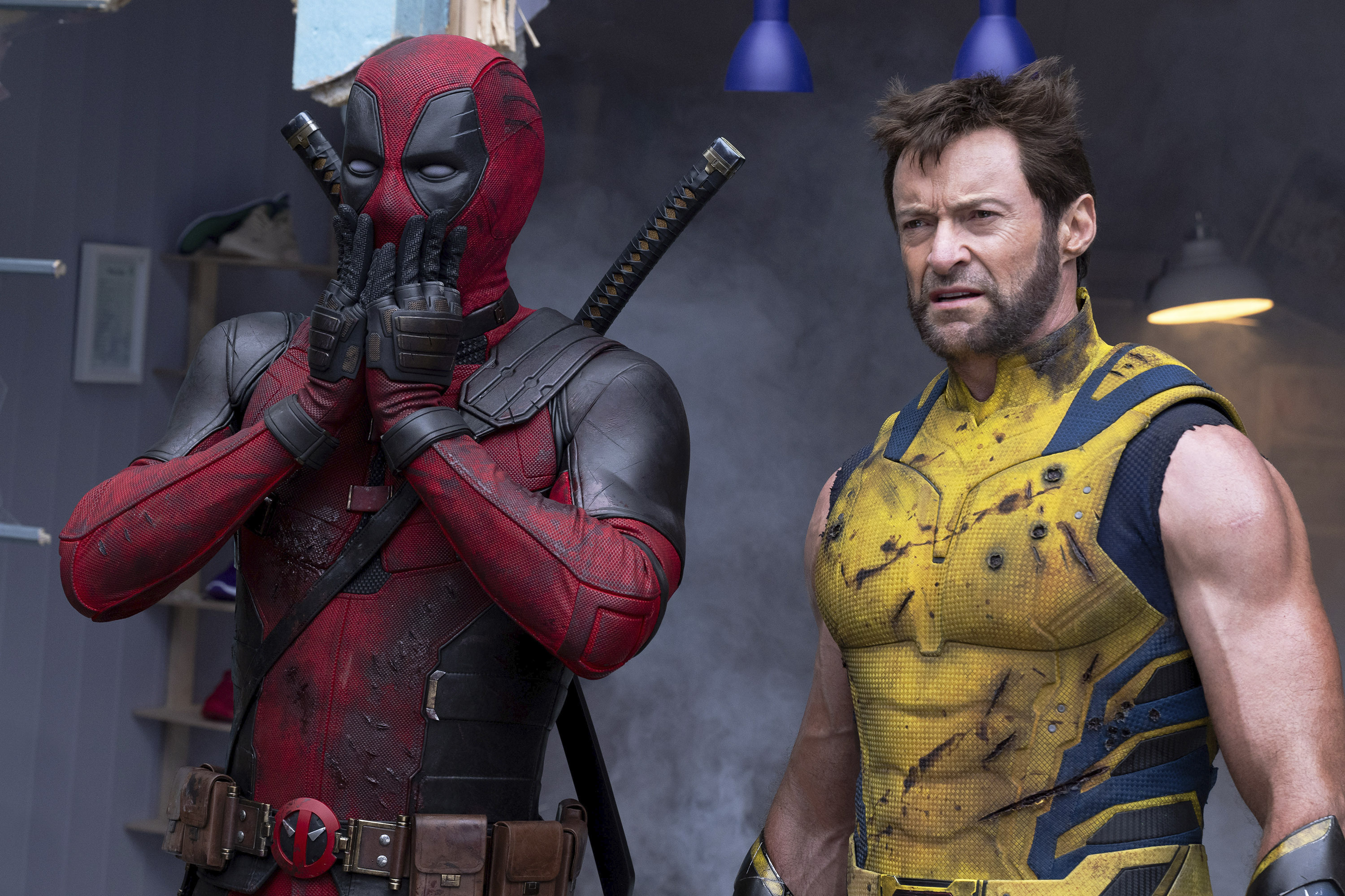 This image released by 20th Century Studios/Marvel Studios shows Ryan Reynolds as Deadpool/Wade Wilson, left, and Hugh Jackman as Wolverine/Logan in a scene from "Deadpool & Wolverine."
