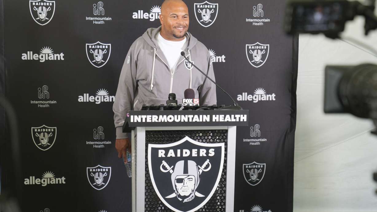 Antonio Pierce, head coach for the Las Vegas Raiders takes questions from reporters about training in Southern California at the Jack R. Hammett Sports Complex in Costa Mesa, Calif., Tuesday, July 23, 2024.