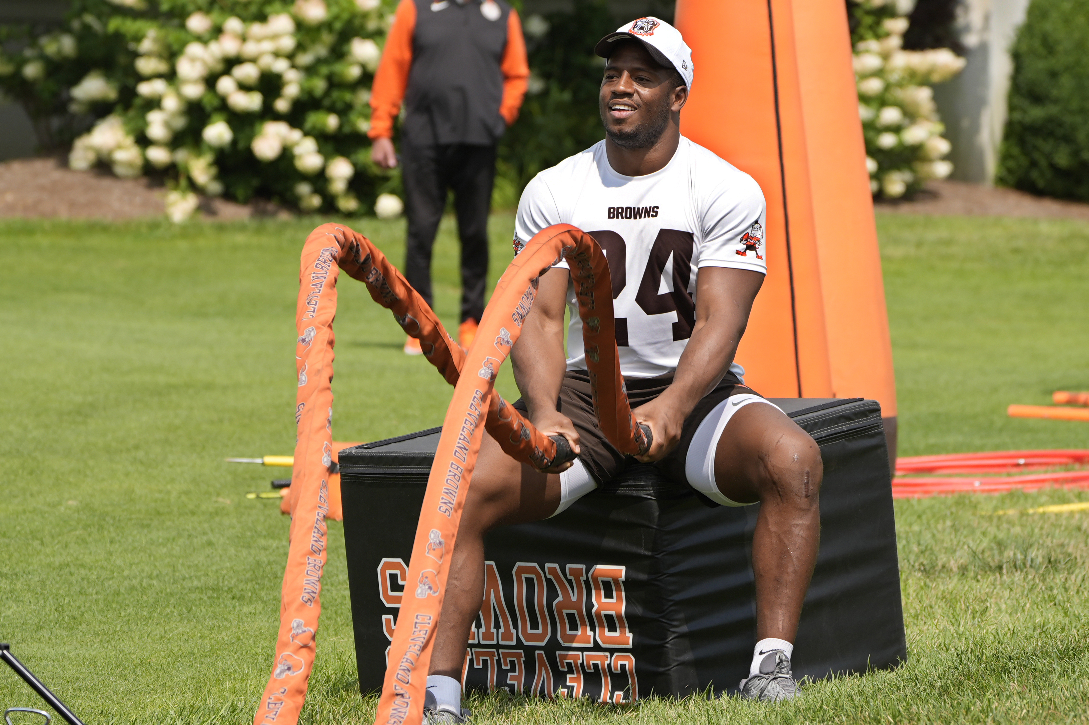Cleveland Browns running back Nick Chubb (24) works out during an NFL football training camp practice Friday, July 26, 2024, in in White Sulphur Springs, W.Va. Chubb is recovering from a season-ending knee injury that required two surgeries.
