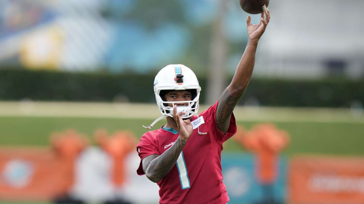 Miami Dolphins quarterback Tua Tagovailoa (1) does drills during NFL football training camp, Wednesday, July 24, 2024, in Miami Gardens, Fla.