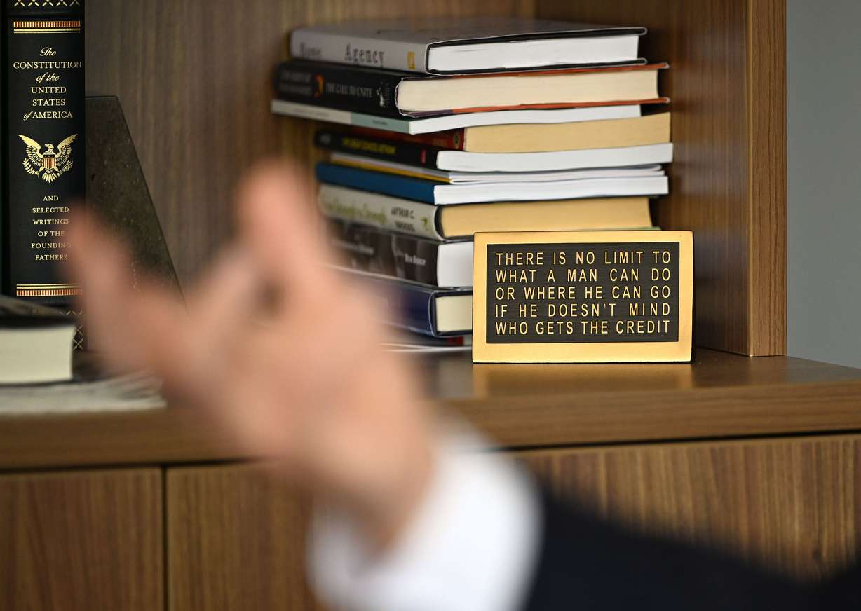 The Constitution and a saying are two items in the office of President and CEO of the Sutherland Institute Rick Larsen as he talks about its statement of principles, refined mission statement and new vision statement in his office in Salt Lake City on July 16.