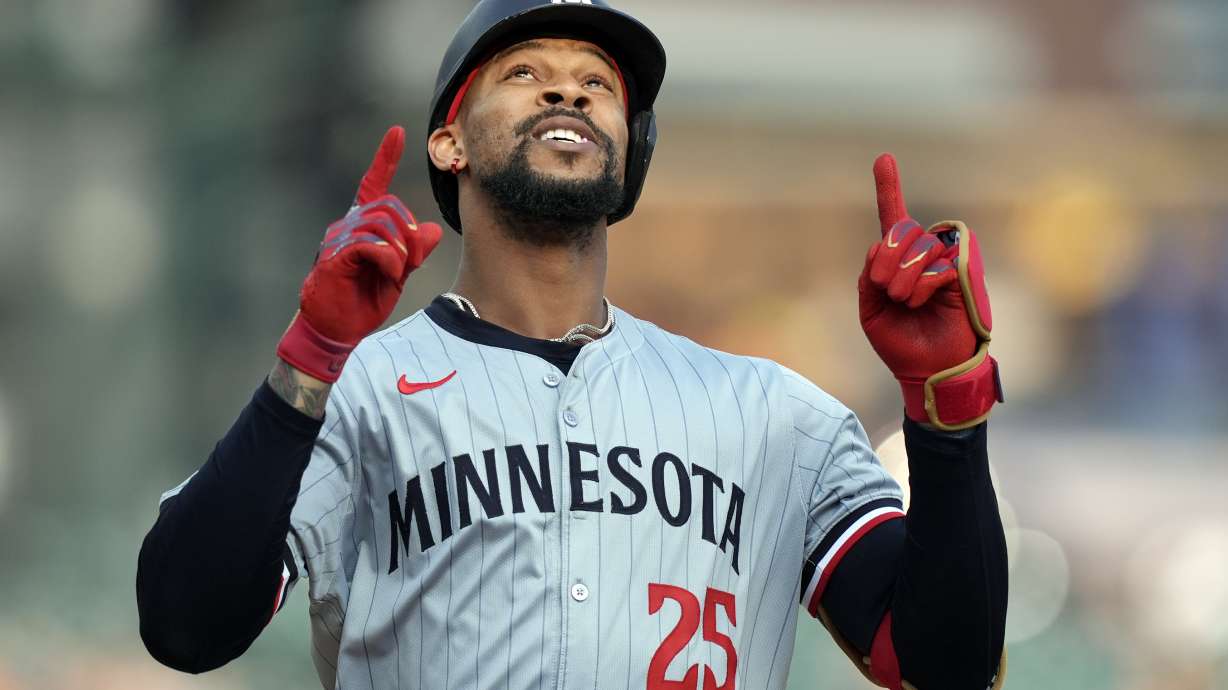 Minnesota Twins' Byron Buxton approaches home plate after a solo home run during the first inning of a baseball game against the Detroit Tigers, Friday, July 26, 2024, in Detroit.
