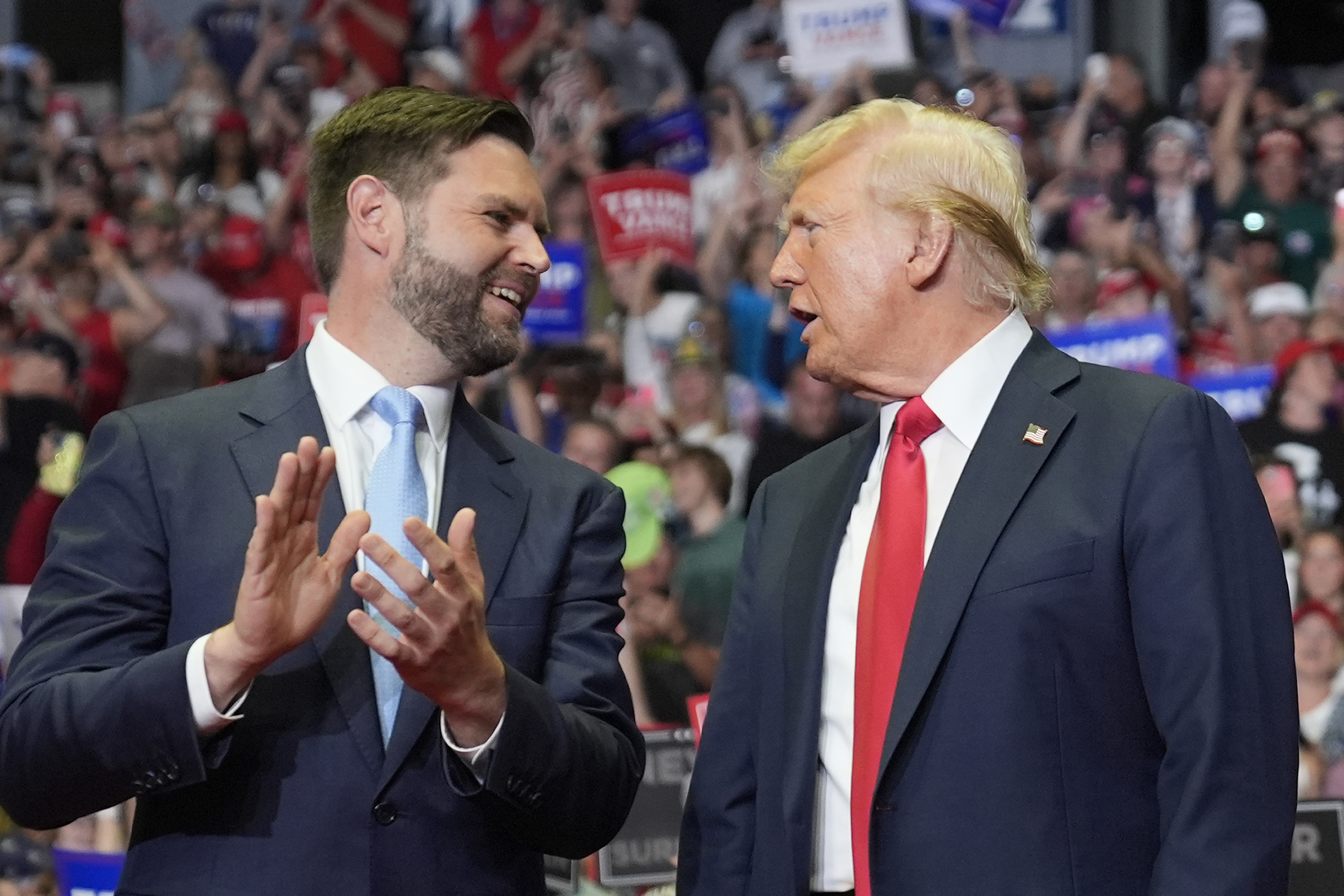 Republican presidential candidate former President Donald Trump and Republican vice presidential candidate Sen. JD Vance, R-Ohio, arrive a campaign rally, July 20, in Grand Rapids, Mich. 