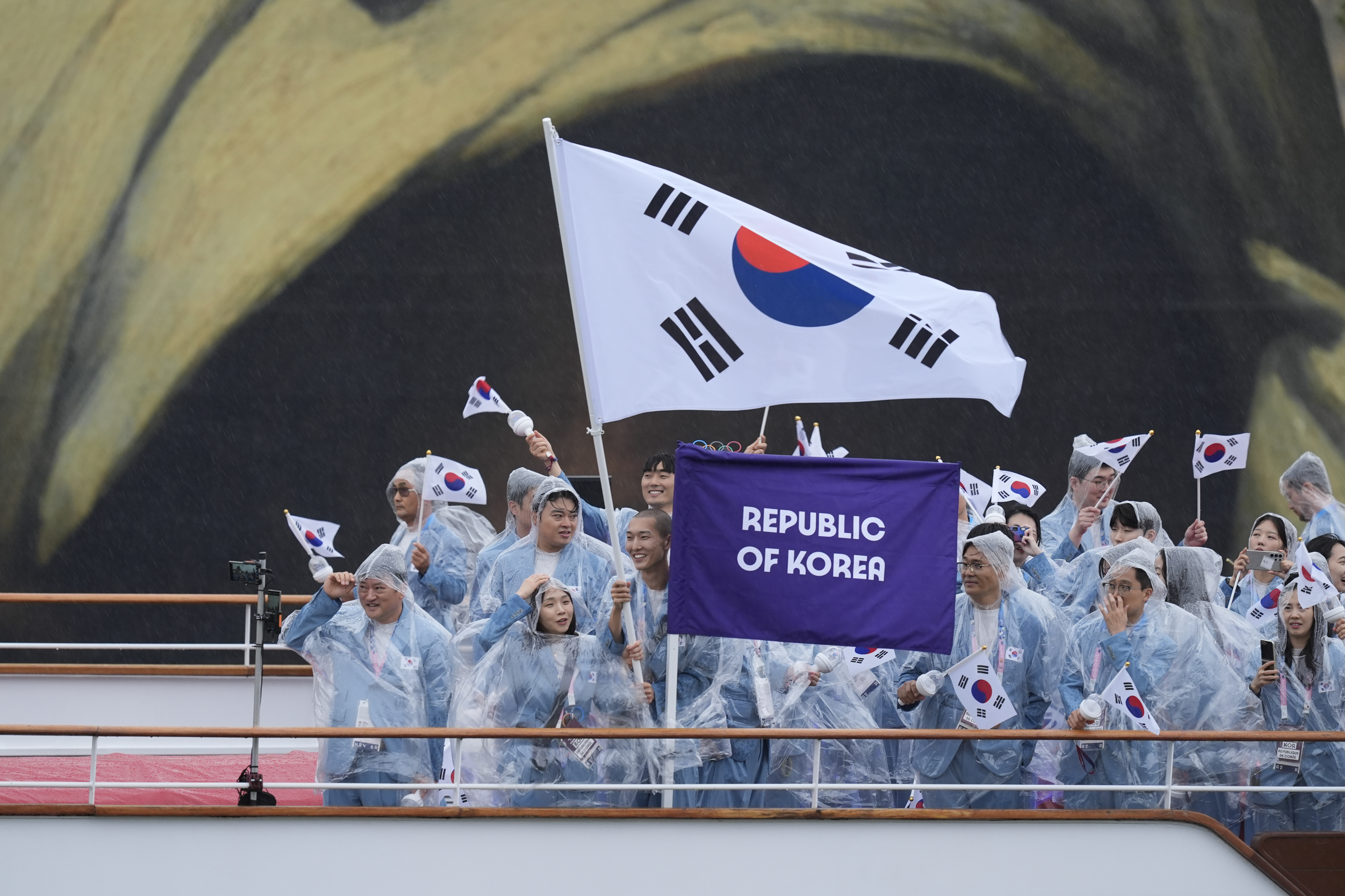 The boat carrying team South Korea makes its way down the Seine in Paris, France, during the opening ceremony of the 2024 Summer Olympics, Friday, July 26, 2024. 