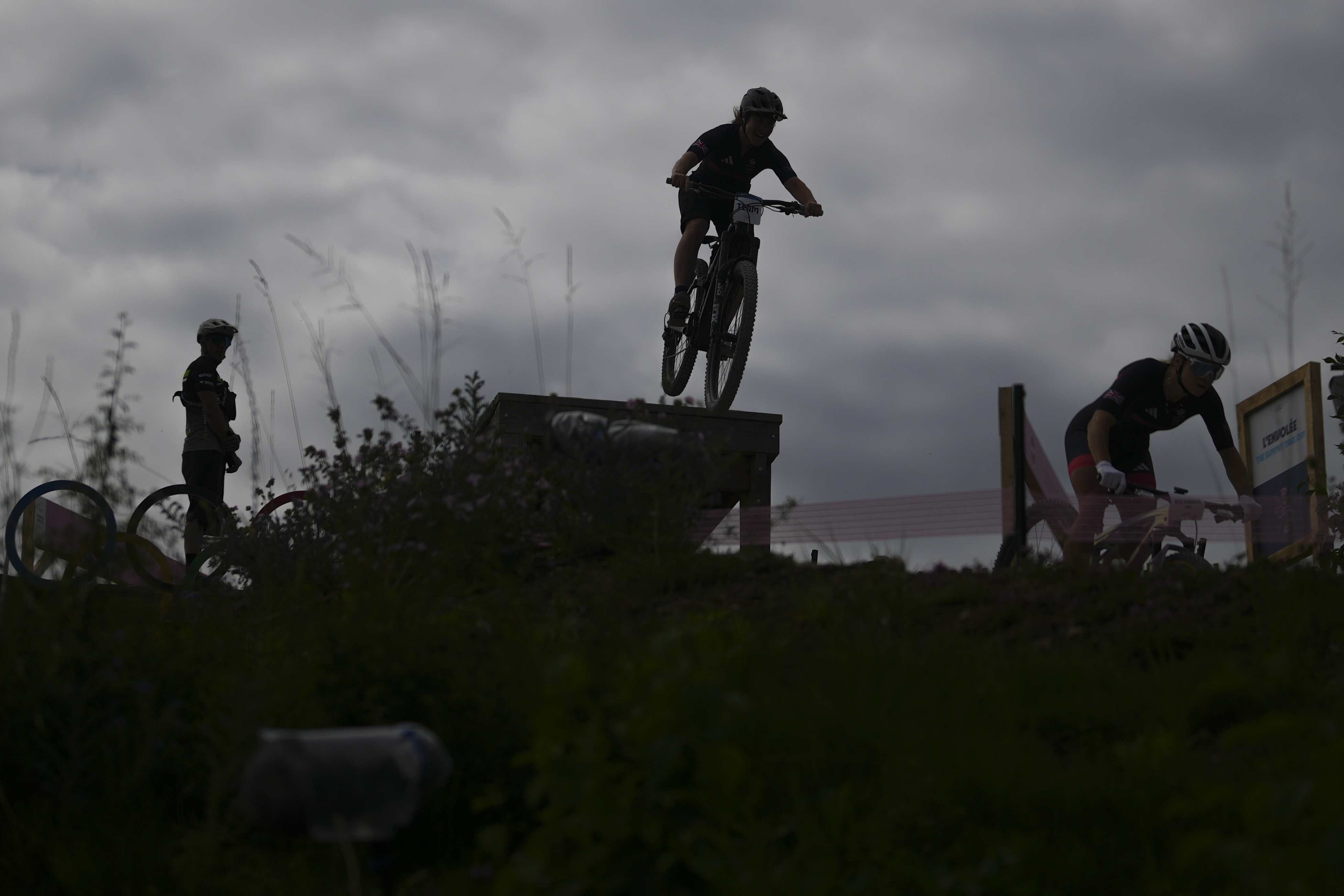 British team members practice at the Mountain Bike cycling track, at the 2024 Summer Olympics, Thursday, July 25, 2024, in Elancourt, France. 