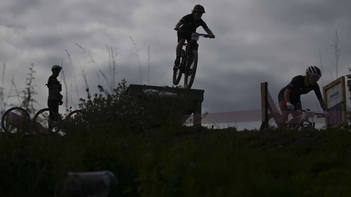 British team members practice at the Mountain Bike cycling track, at the 2024 Summer Olympics, Thursday, July 25, 2024, in Elancourt, France.
