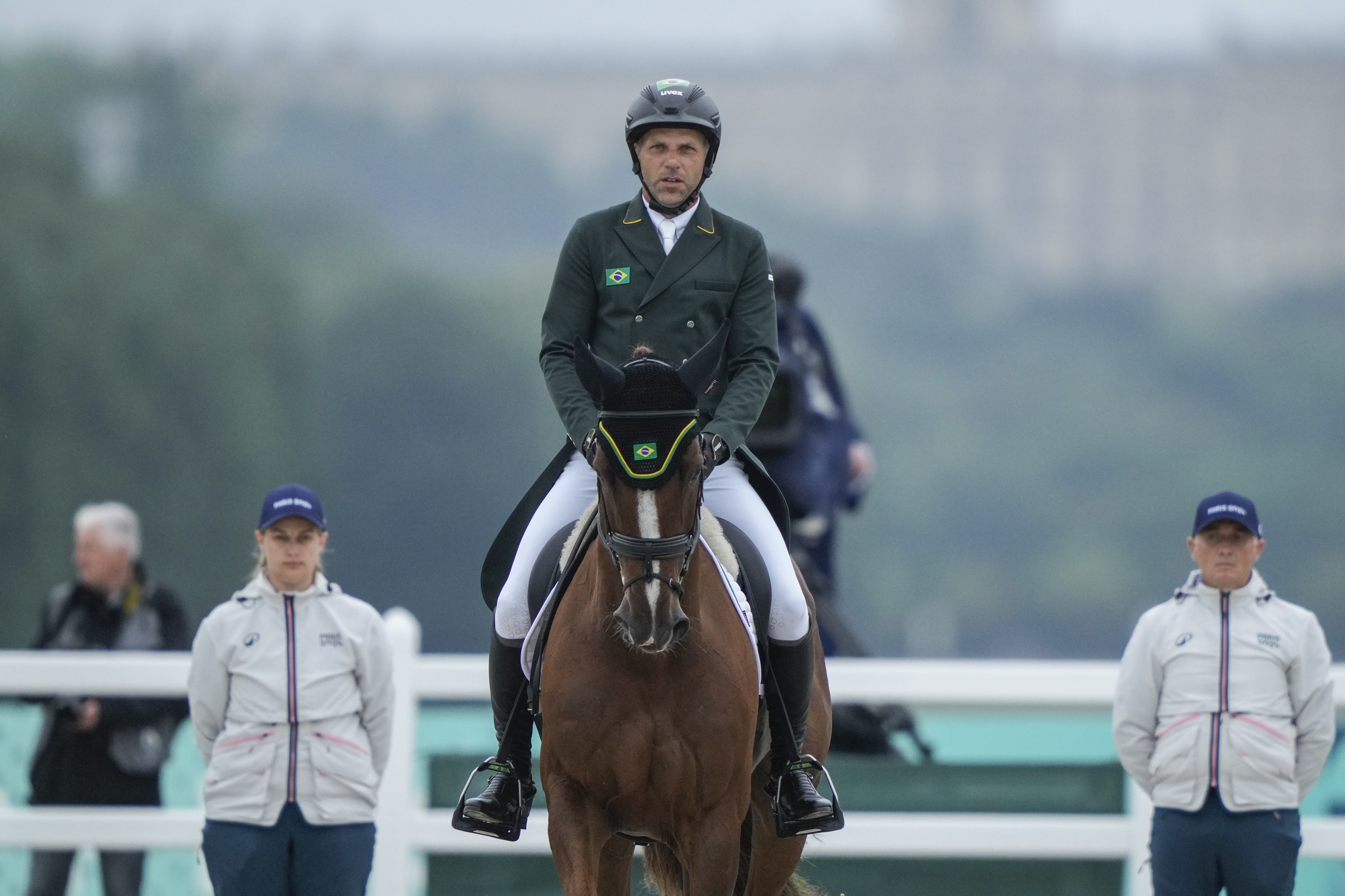 Brazil's Carlos Parros and his horse Safira during the Equestrian Eventing Dressage competition, at the 2024 Summer Olympics, Saturday, July 27, 2024, in Versailles, France. 