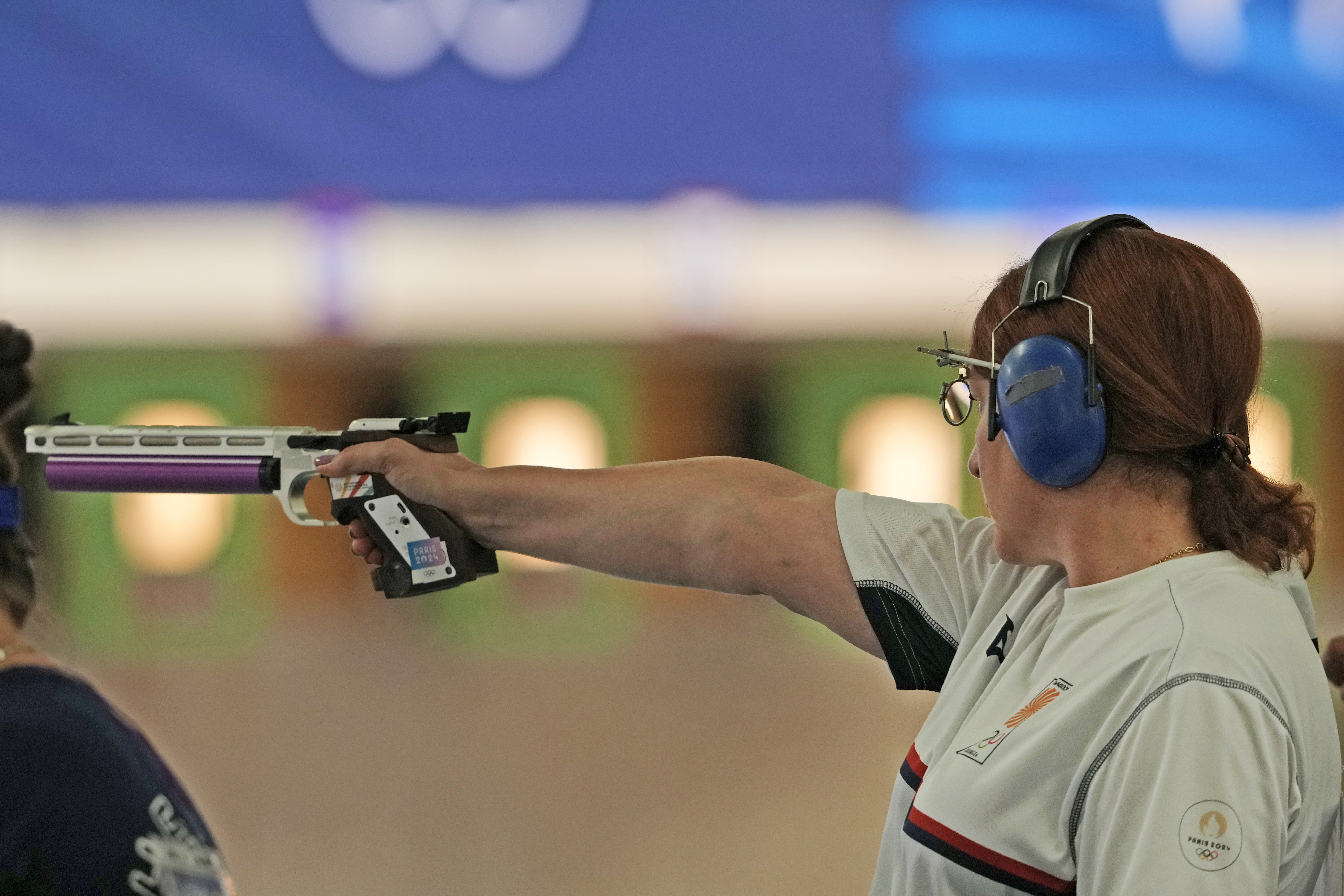 Georgia's Nino Salukvadze competes in the 10m air pistol women's qualification round at the 2024 Summer Olympics, Saturday, July 27, 2024, in Chateauroux, France. 