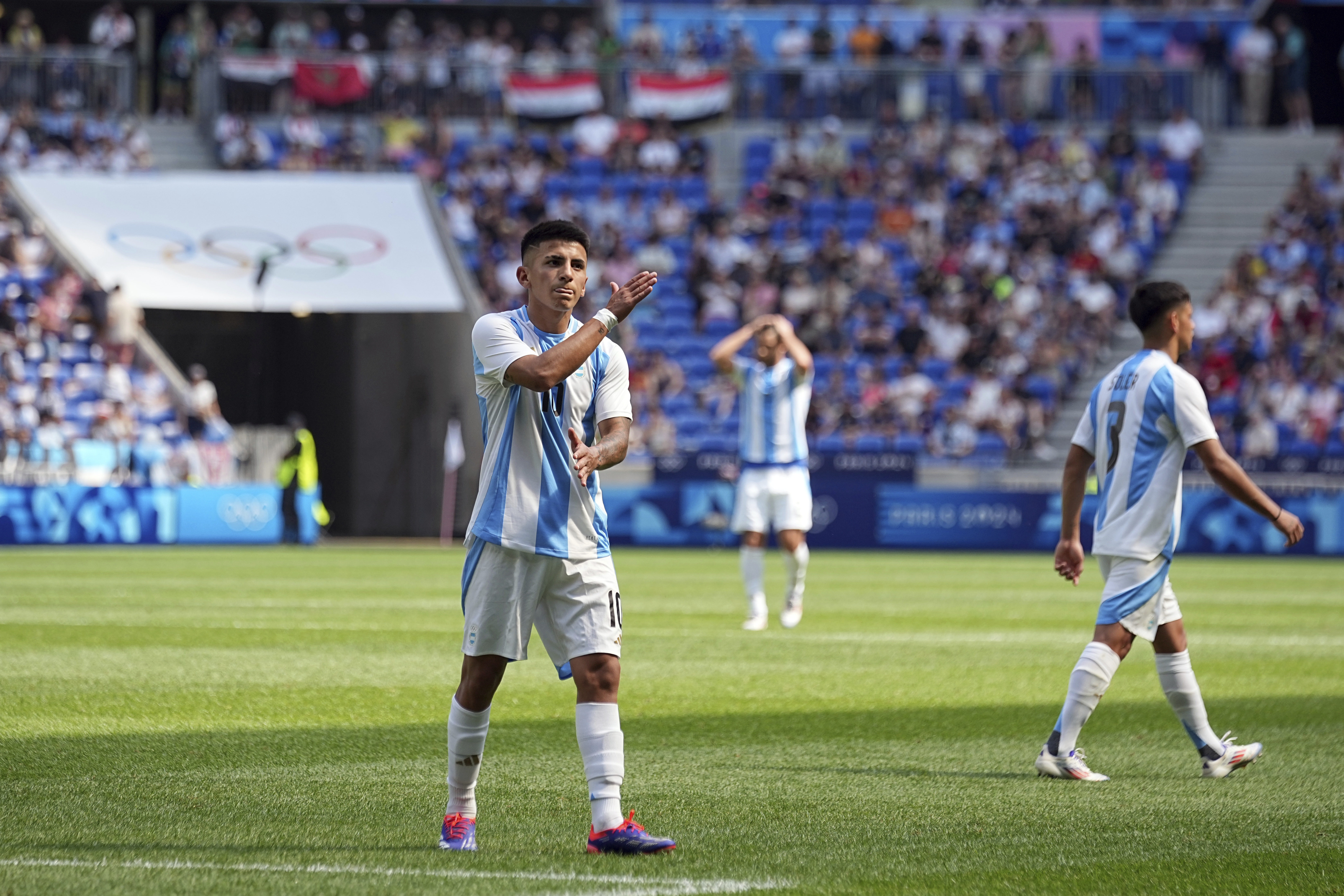 Argentina's Thiago Almada gestures during the men's Group B soccer match between Argentina and Iraq at the Lyon stadium during the 2024 Summer Olympics, Saturday, July 27, 2024, in Decines, France. 