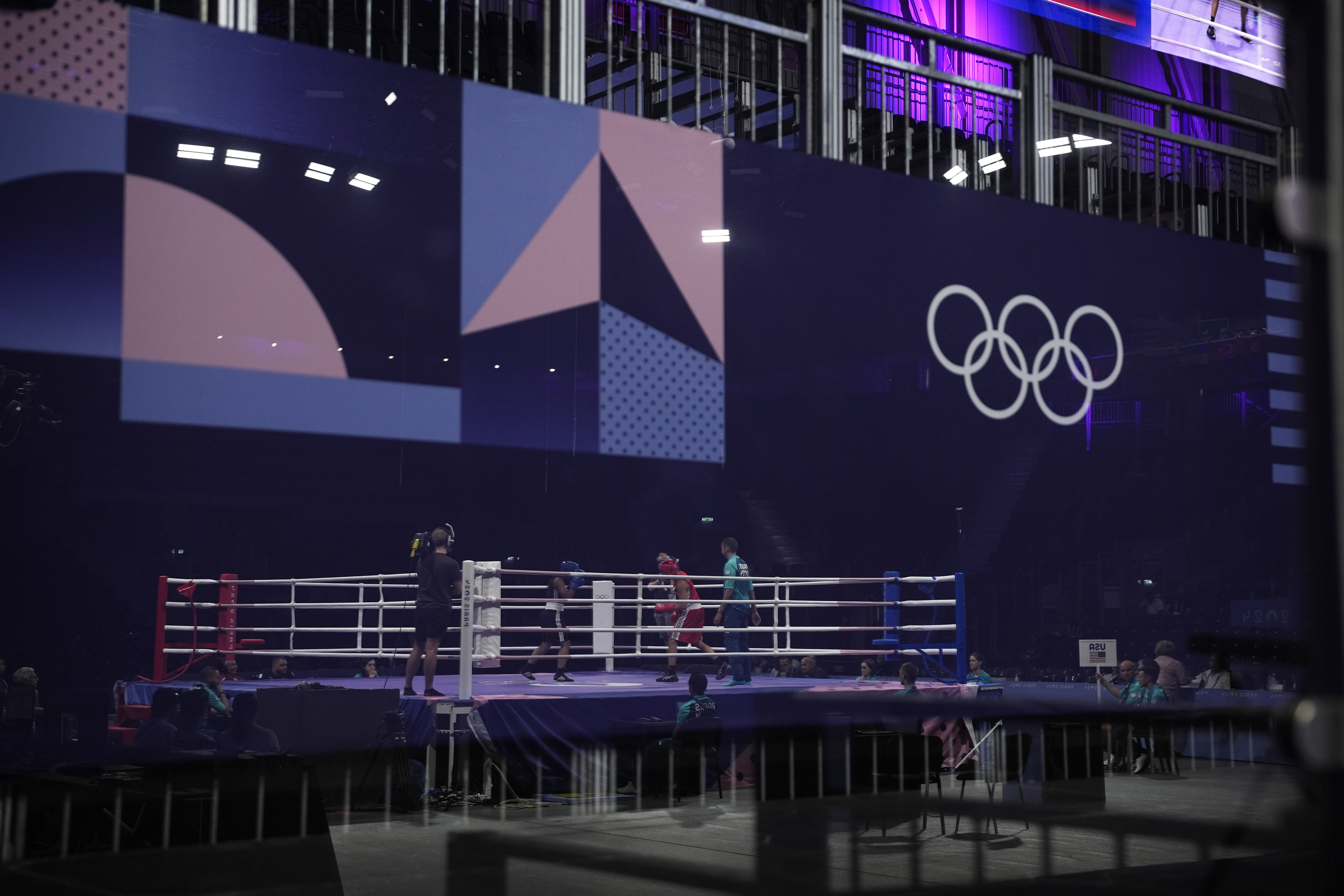 Stand-in boxers are seen in the ring during rehearsals ahead of the boxing event at the 2024 Summer Olympics, Thursday, July 25, 2024, in Paris, France. 