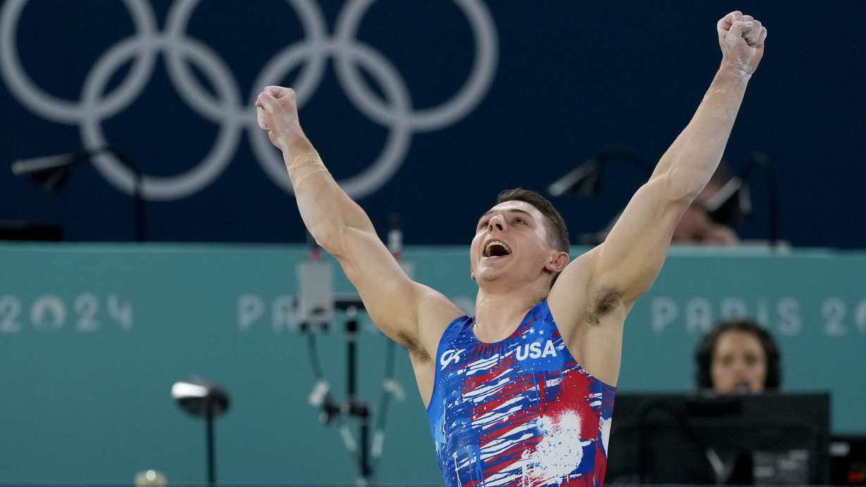 Paul Juda, of United States, celebrates after competing on the floor exercise during a men's artistic gymnastics qualification round at the 2024 Summer Olympics, Saturday, July 27, 2024, in Paris, France.