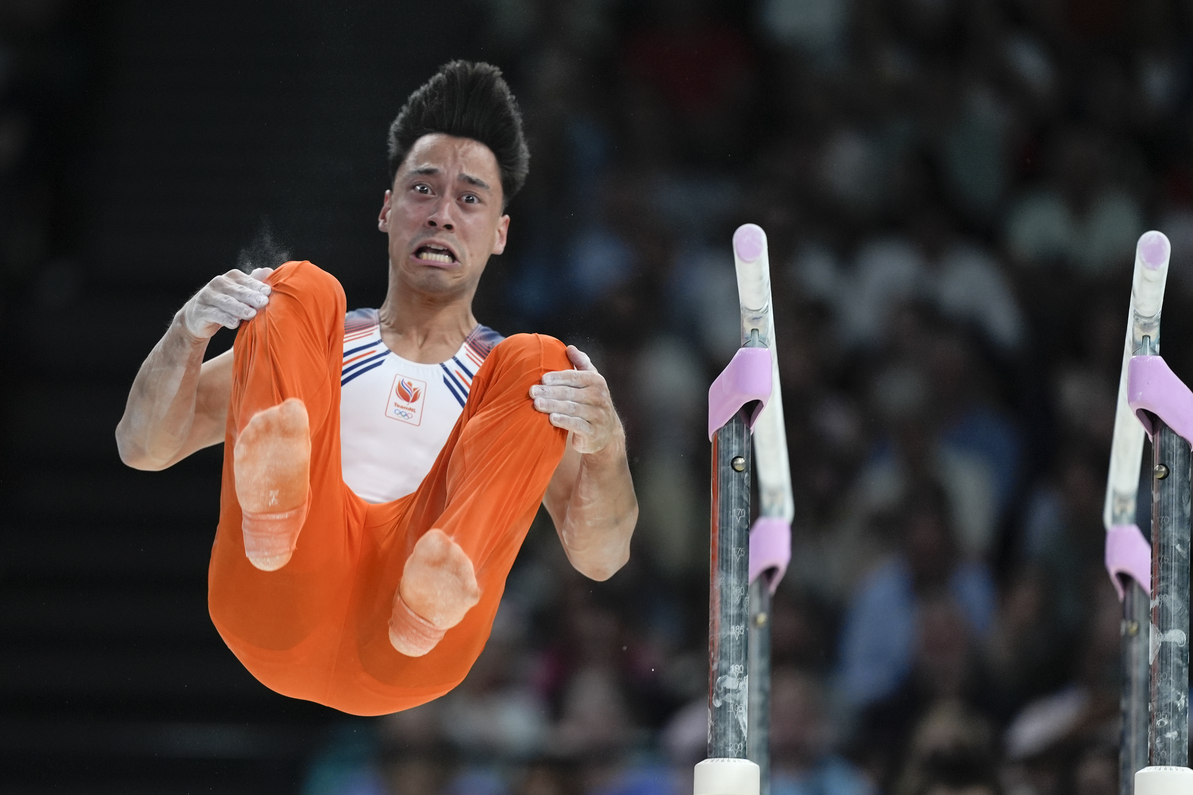 Loran de Munck, of Netherlands, competes on the parallel bars during a men's artistic gymnastics qualification round at the 2024 Summer Olympics, Saturday, July 27, 2024, in Paris, France. 